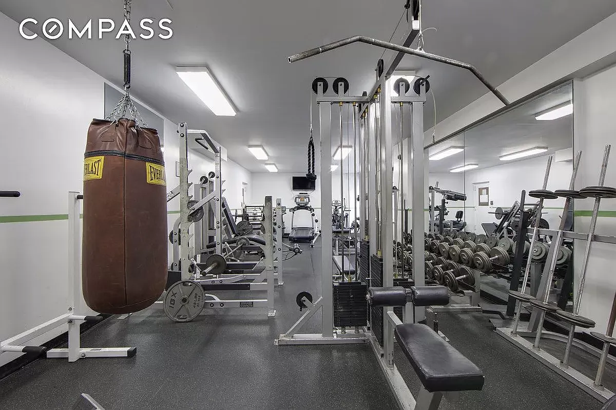 222 West 14th Street, Unit 7D Manhattan, NY 10011 - Photo 7 of 9 a view of a room with gym equipment