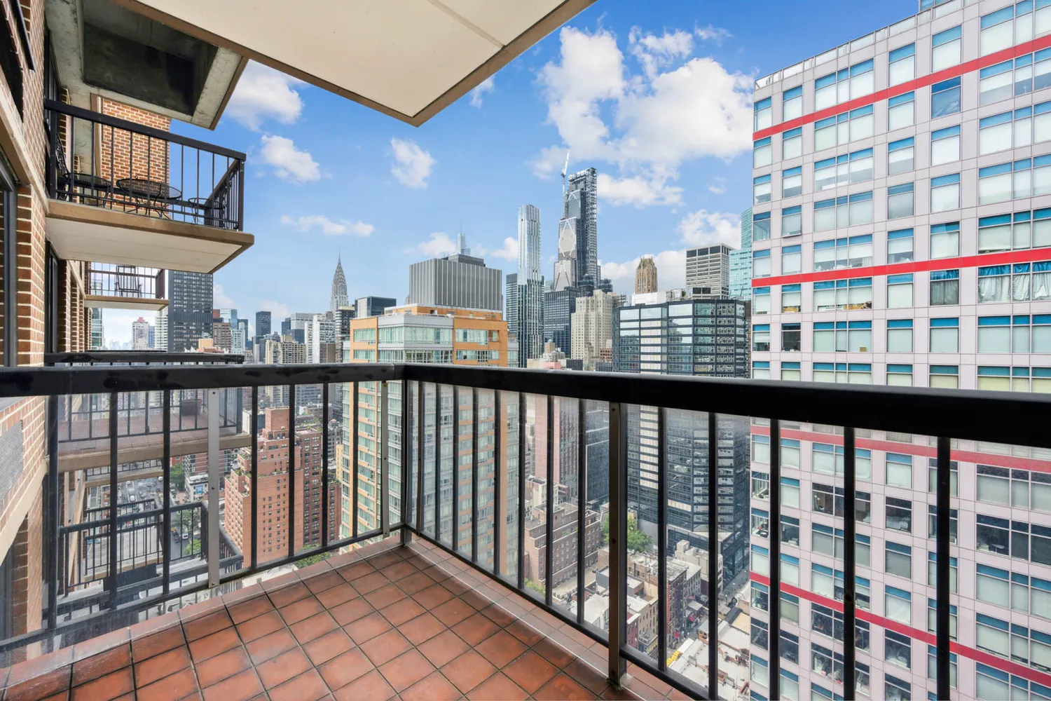 a view of city from a balcony
