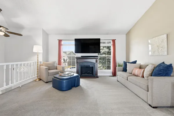 a kitchen with stainless steel appliances granite countertop a refrigerator a stove a sink dishwasher and a refrigerator