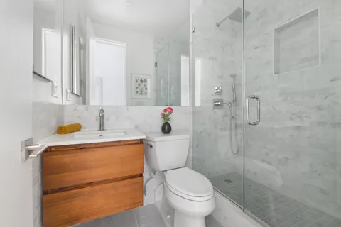 a view of a city with tall buildings