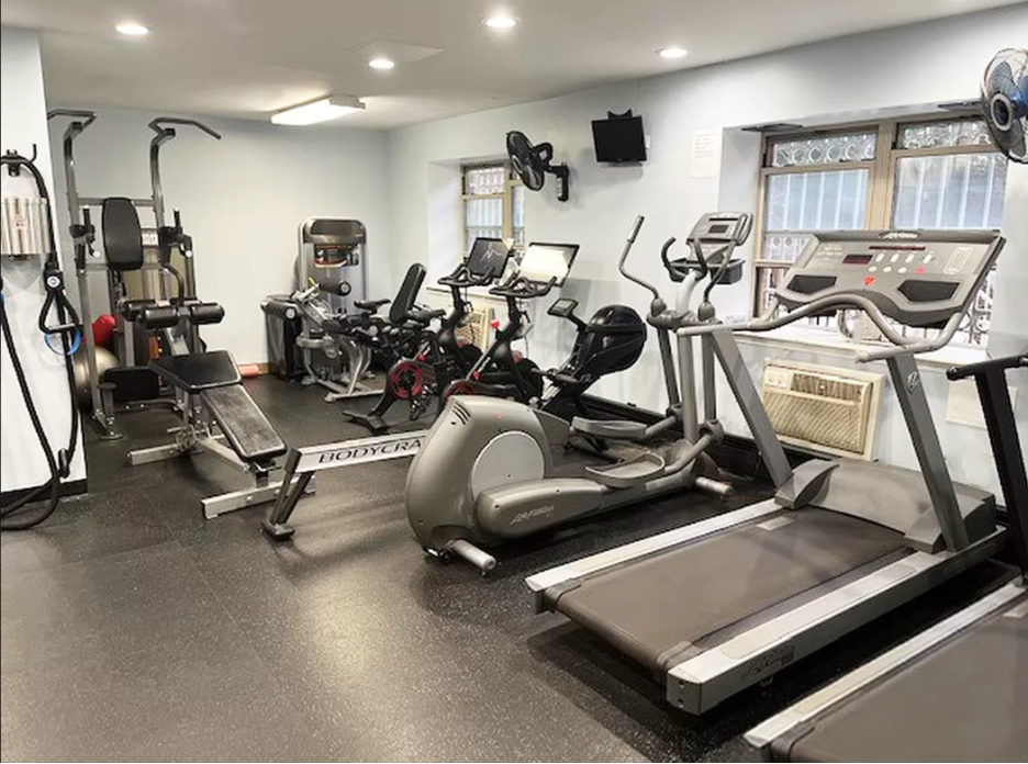 1787 Madison Avenue, Unit 505 Manhattan, NY 10035 - Photo 8 of 11 a view of a room with gym equipment
