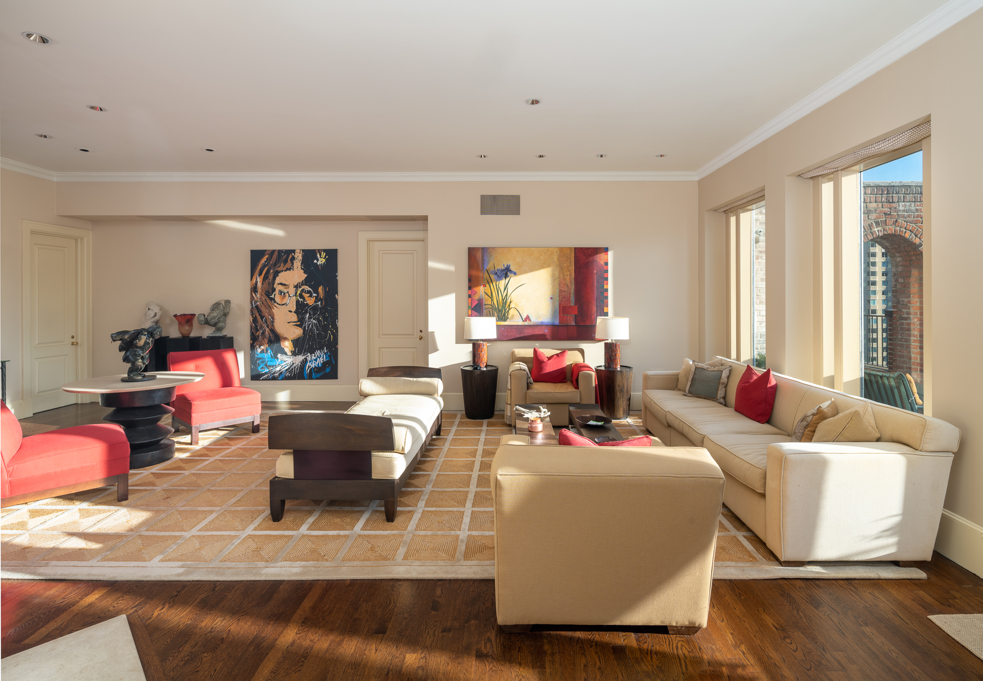 340 East 72nd Street, Unit PH Manhattan, NY 10021 - Photo 2 of 12 a living room with furniture and a large window