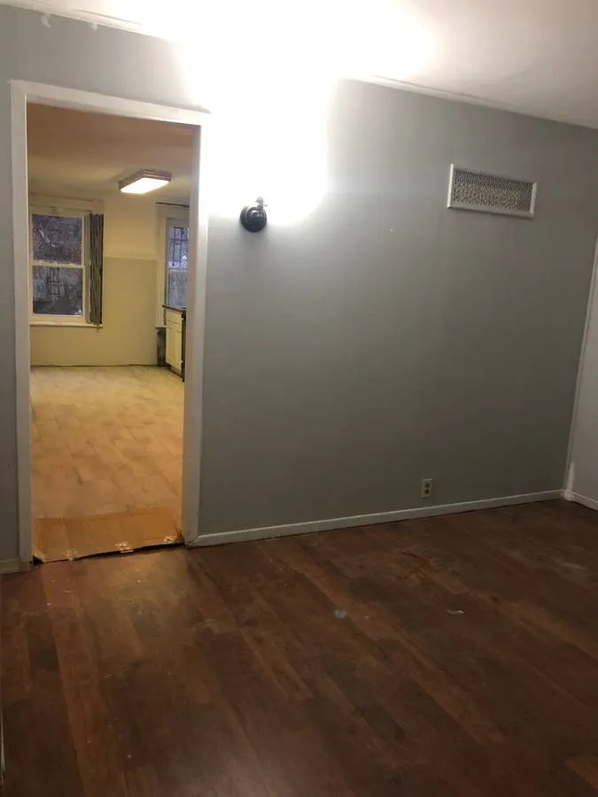 an empty room with a door