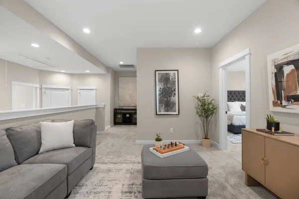 a living room with furniture and a couch