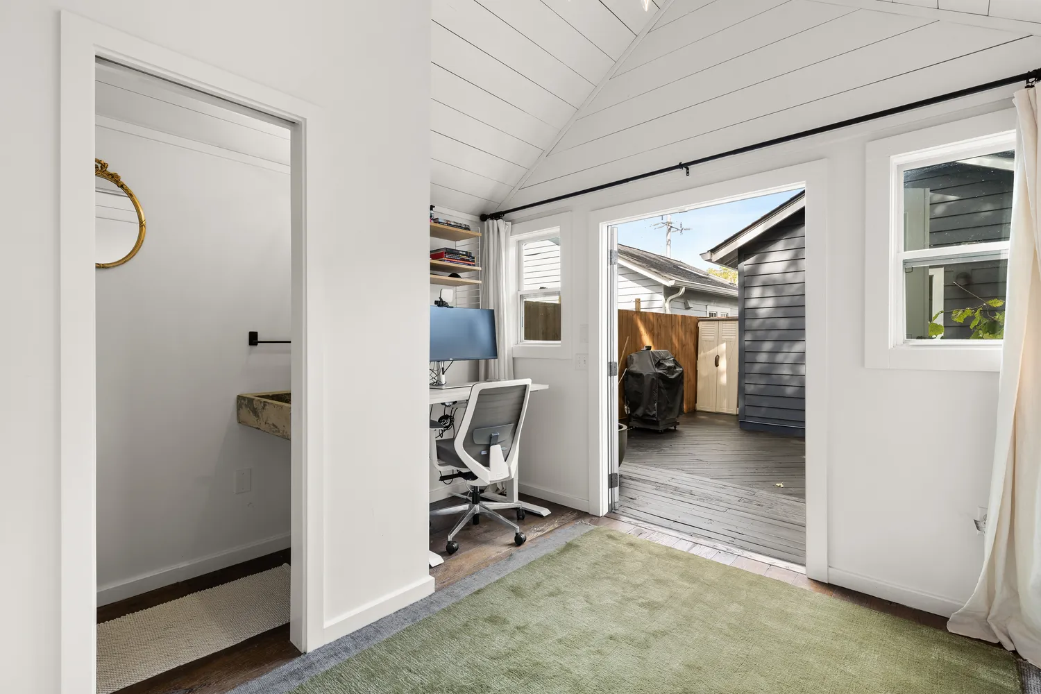 a view of a entryway door and hallway