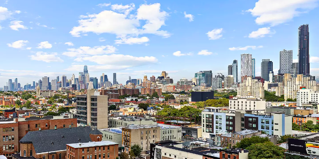 251 1st Street, Unit 7F Brooklyn, NY 11215 - Photo 18 of 24 a view of a city with tall buildings