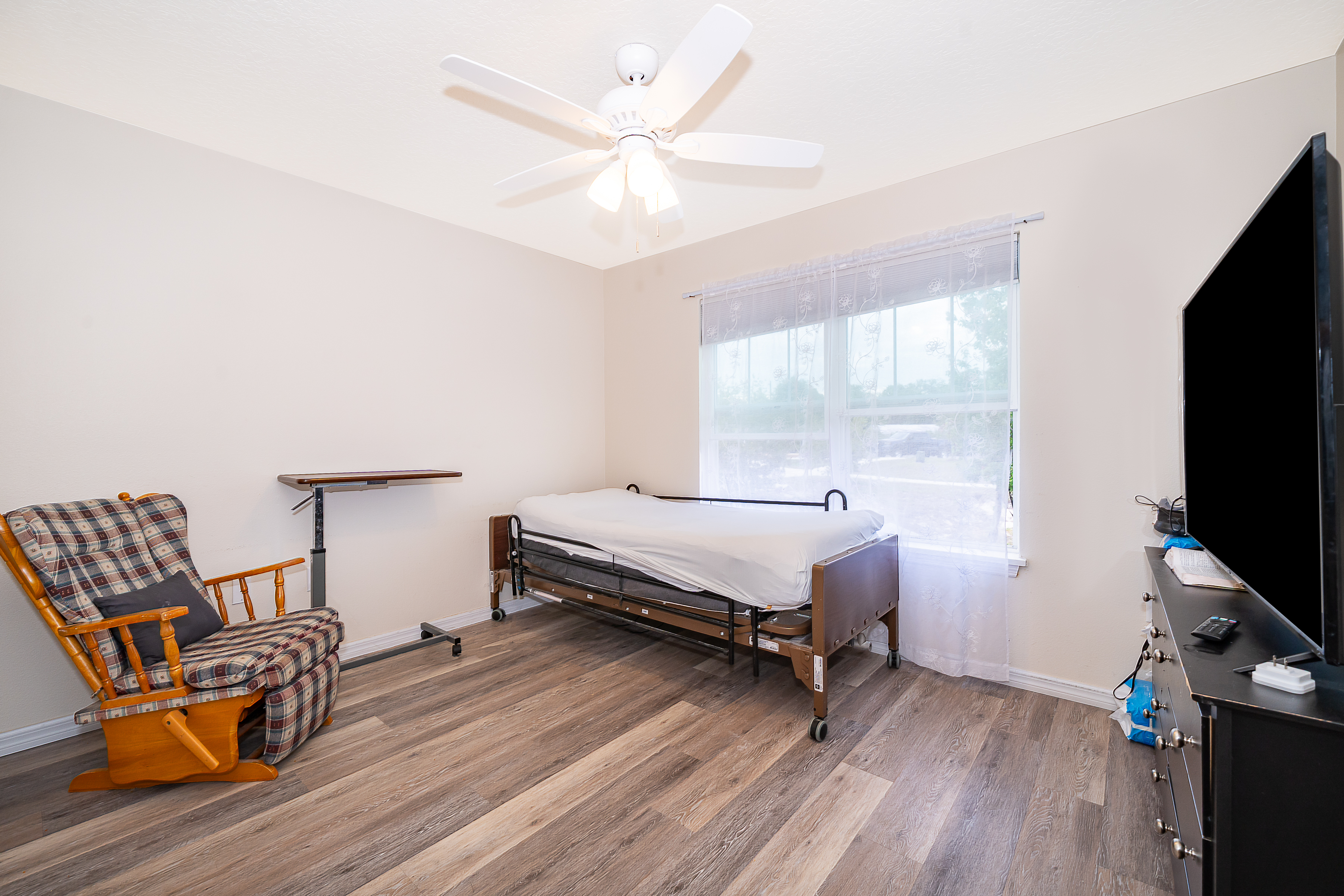 1360 Cottage Circle Tavares, FL 32778 - Photo 12 of 25 a bedroom with furniture and a flat screen tv