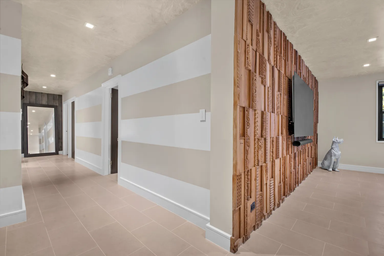 a view of a hallway with closet area
