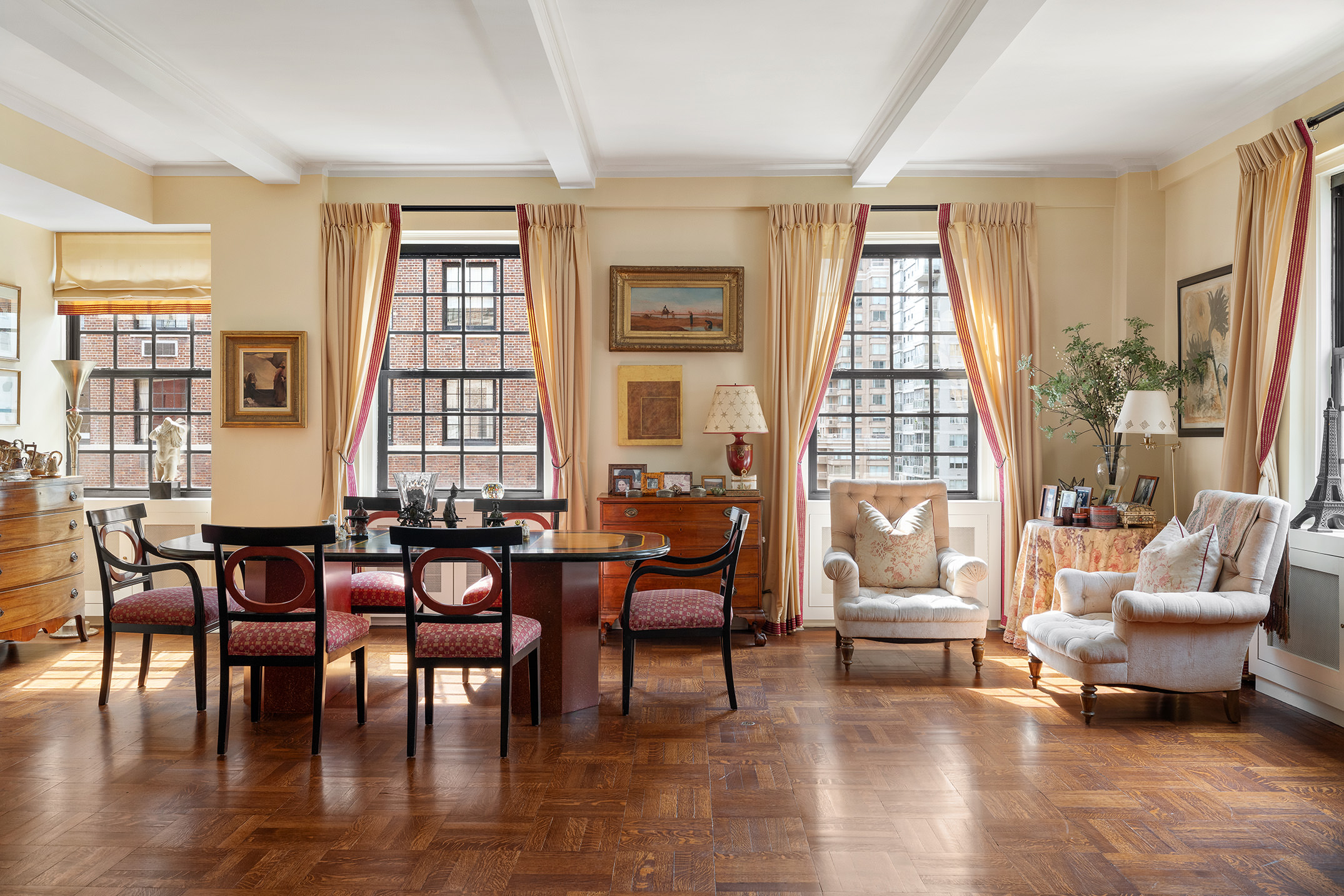 129 East 69th Street, Unit 8/9A Manhattan, NY 10021 - Photo 3 of 16 a view of a livingroom with furniture window and outside view
