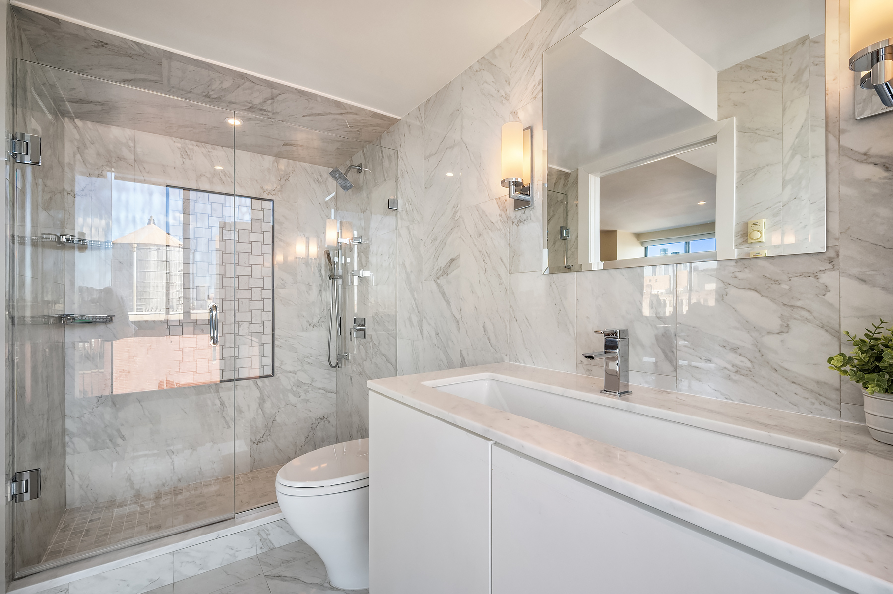 366 West 11th Street, Unit PHF Manhattan, NY 10014 - Photo 15 of 28 a bathroom with a sink a toilet and shower