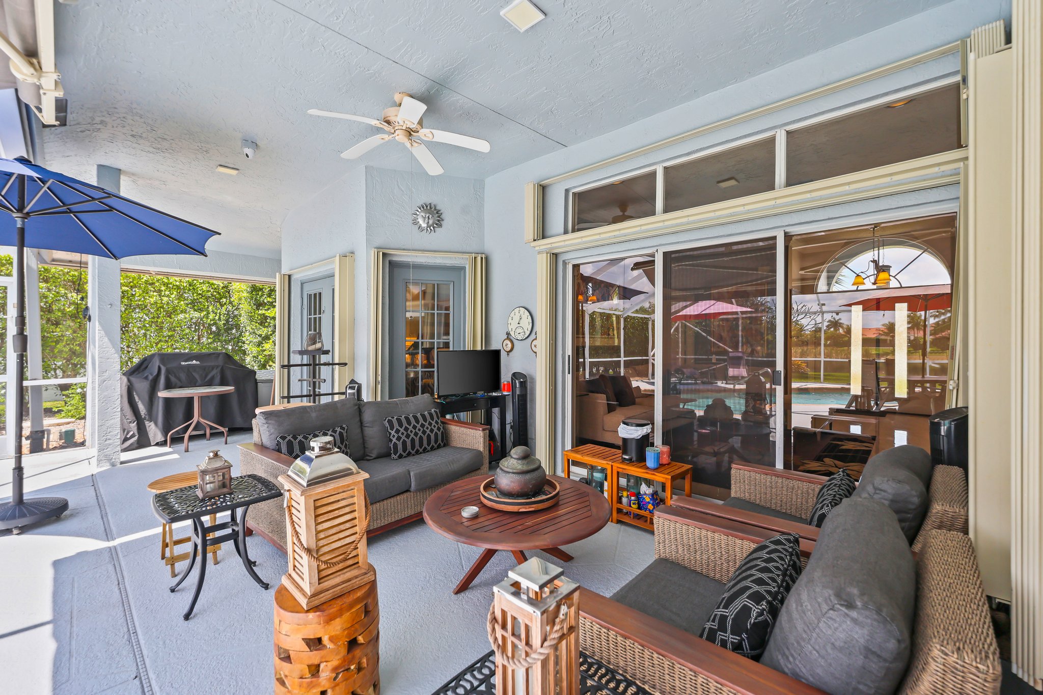 20317 Hacienda Court Boca Raton, FL 33498 - Photo 49 of 100 a living room with furniture and a large window
