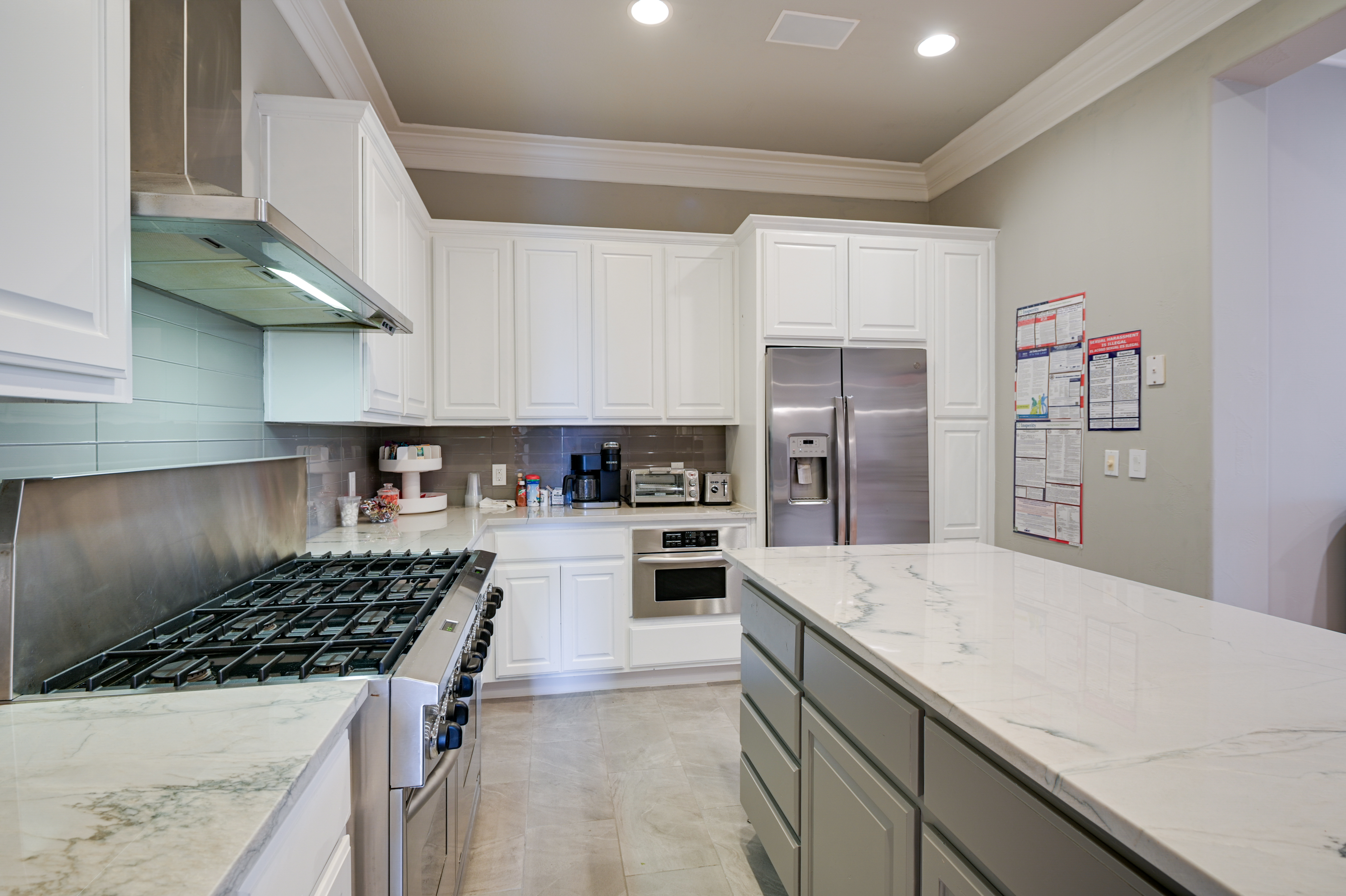 14913 Murfin Road Austin, TX 78734 - Photo 10 of 40 a kitchen with a sink stove and refrigerator