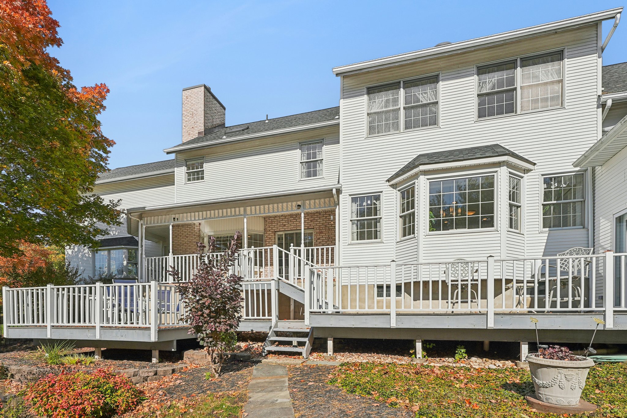 905 Kip Lane Neshanic Station, NJ 08853 - Photo 47 of 50 a front view of a house with a wooden deck