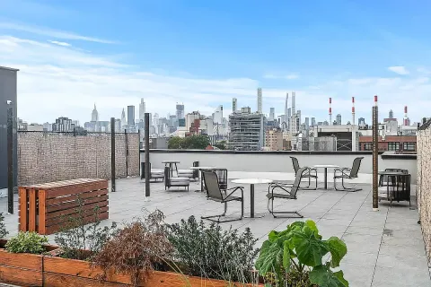 a view of a terrace with sitting area