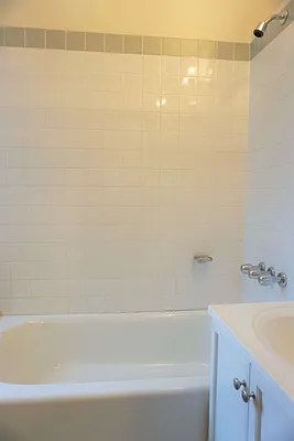 114 East 7th Street, Unit 16 Manhattan, NY 10009 - Photo 6 of 7 a bathroom with a bathtub