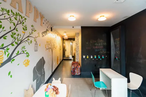 a living room with patio furniture