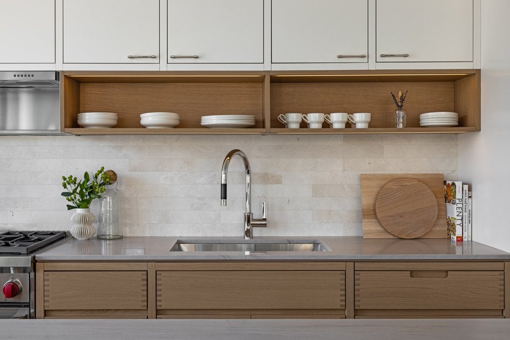 250 West 96th Street, Unit 7D Manhattan, NY 10025 - Photo 8 of 30 a kitchen sink with white cabinets and potted plants