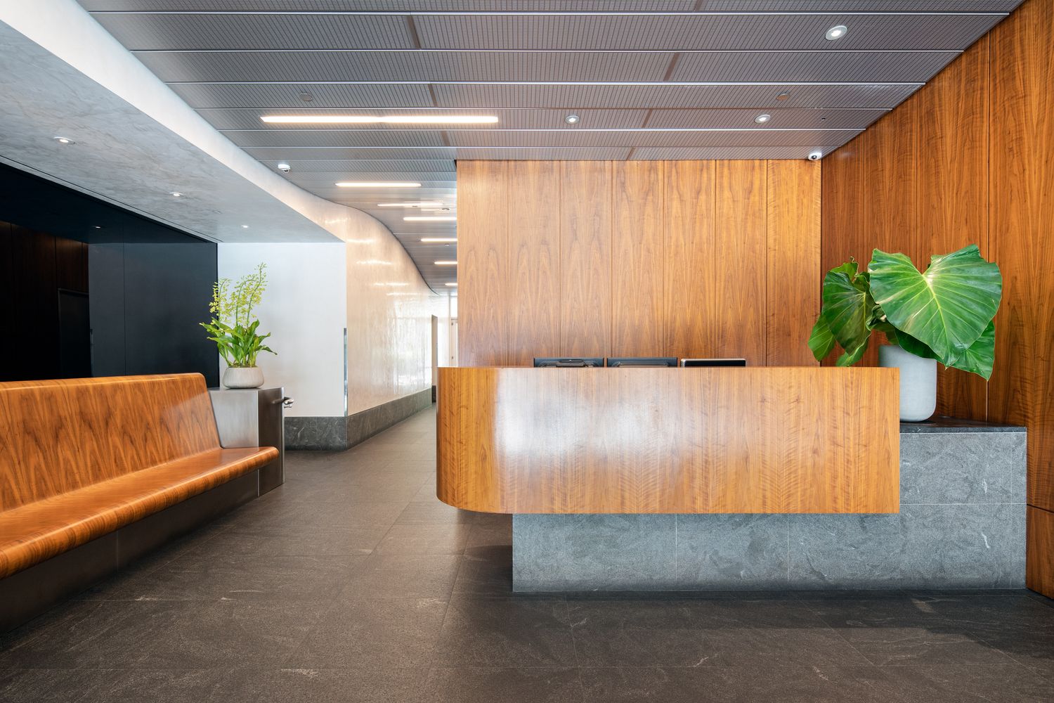 311 West Broadway, Unit 5G Manhattan, NY 10013 - Photo 10 of 14 a living room with furniture flowerpot and wooden floor