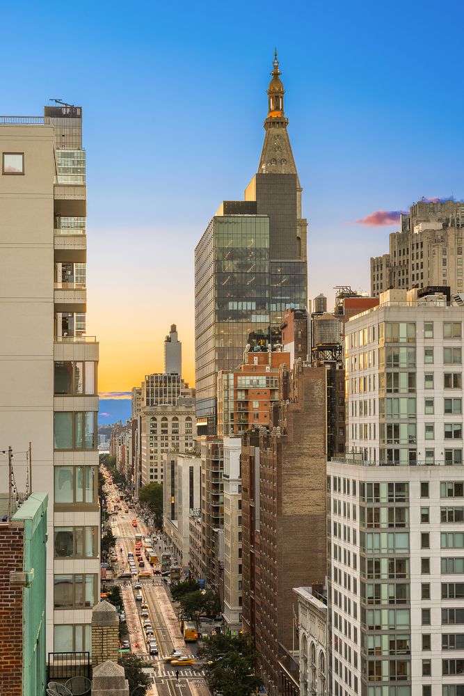 a view of a city with tall buildings