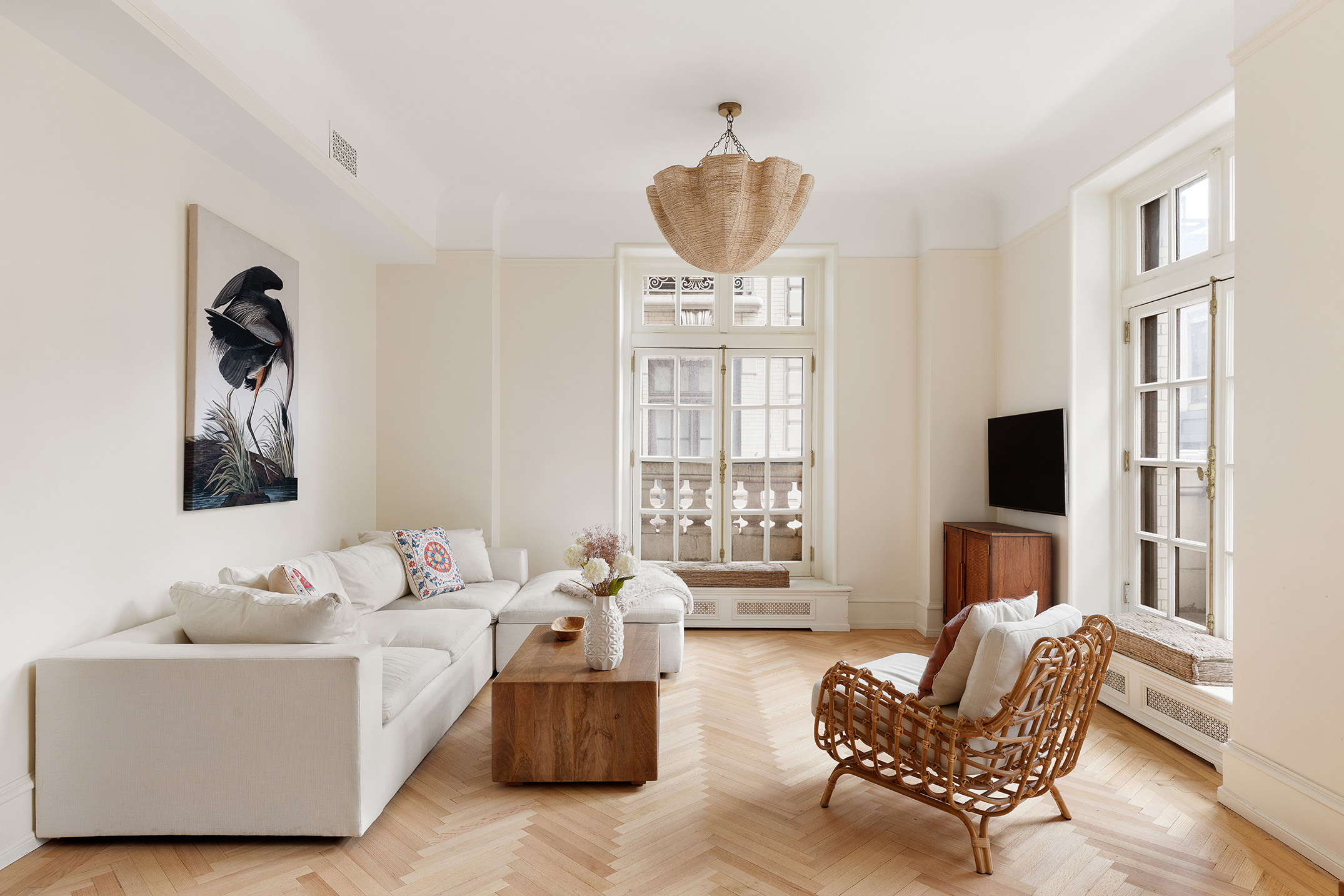 2109 Broadway, Unit 4126 Manhattan, NY 10023 - Photo 3 of 18 a living room with furniture and a flat screen tv