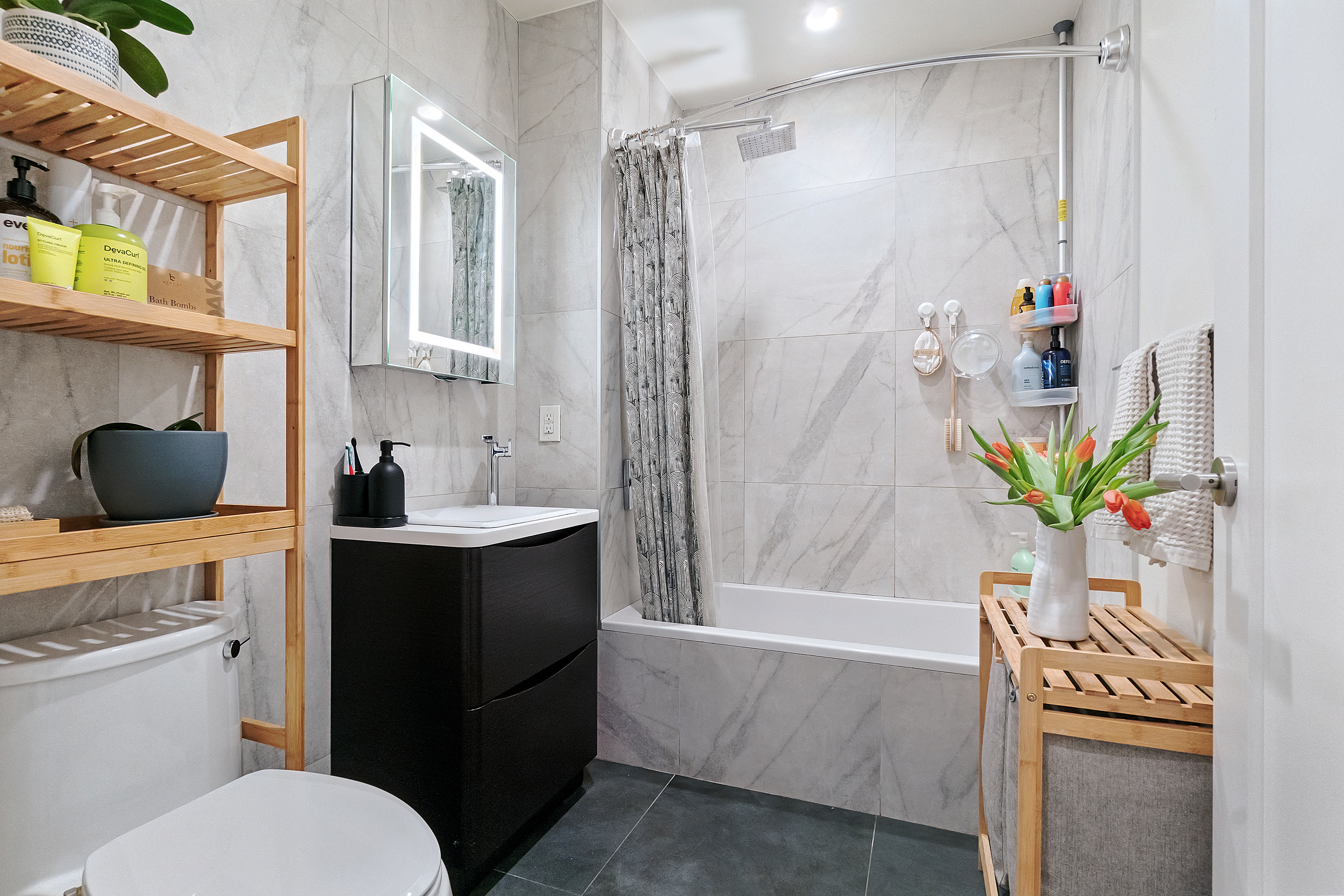 401 Rutland Road, Unit 2C Brooklyn, NY 11203 - Photo 5 of 13 a bathroom with a sink a toilet and shower