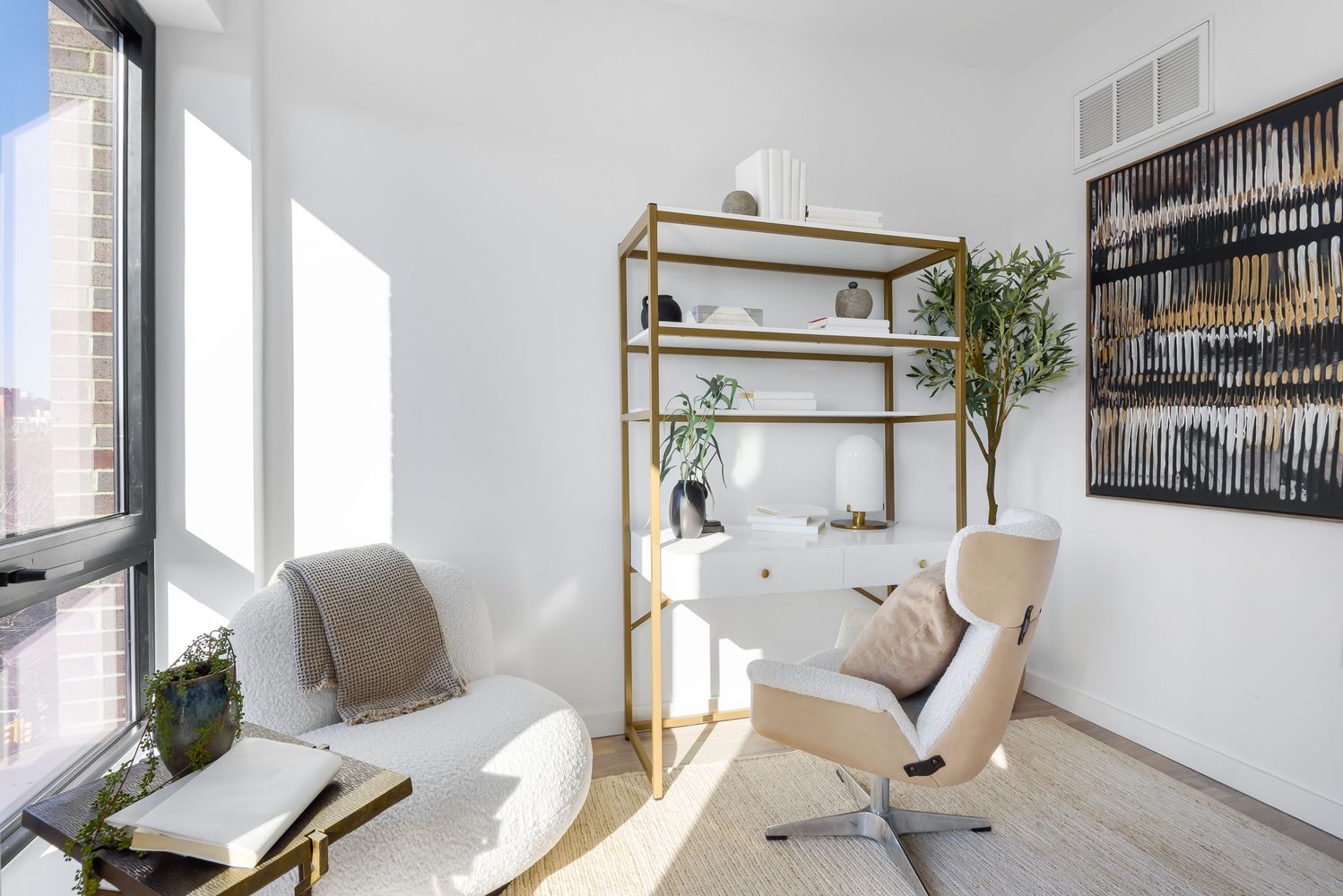 a living room with furniture a window and a couch