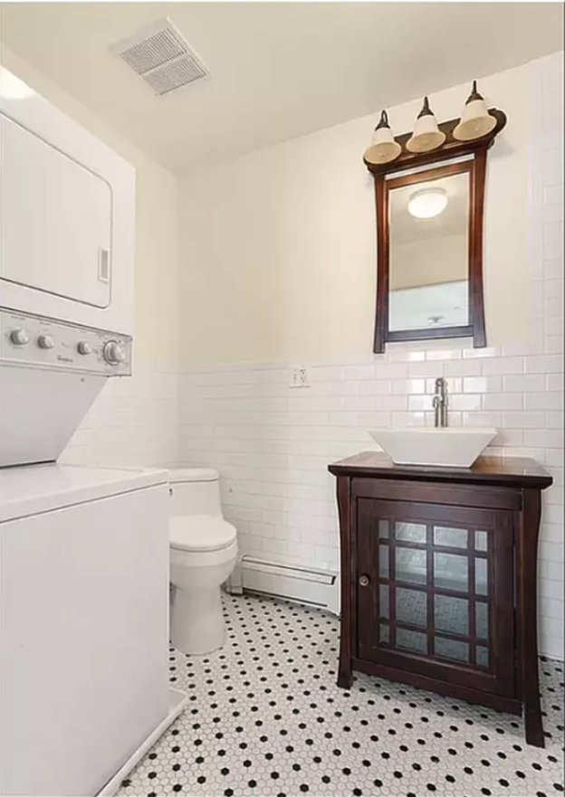 68 Maspeth Avenue, Unit 3A Brooklyn, NY 11211 - Photo 4 of 9 a bathroom with a sink a toilet and mirror