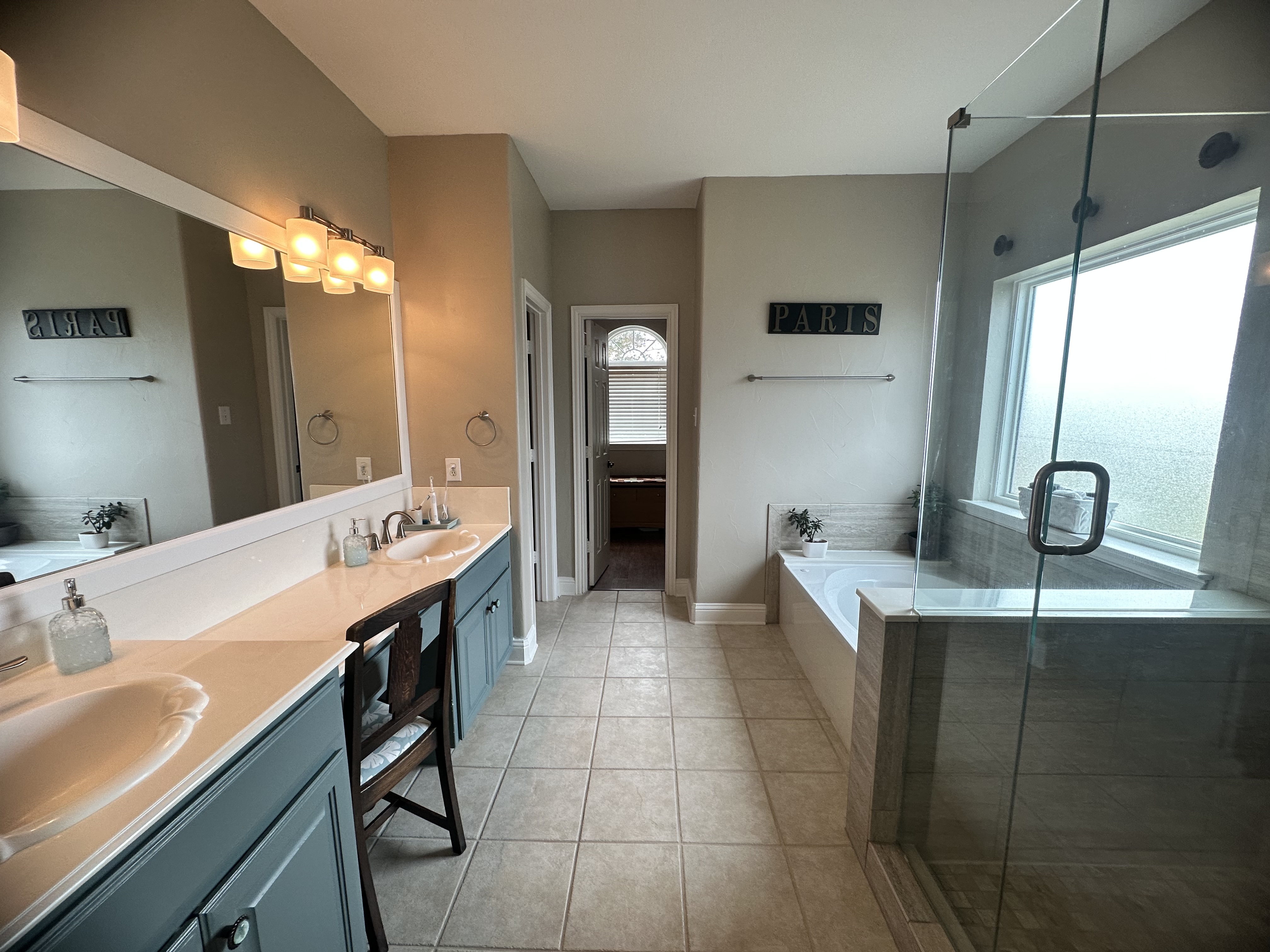 3588 Heritage Trail Celina, TX 75009 - Photo 12 of 19 a bathroom with a double vanity sink and a mirror