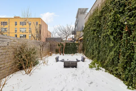 a view of roof with sitting area