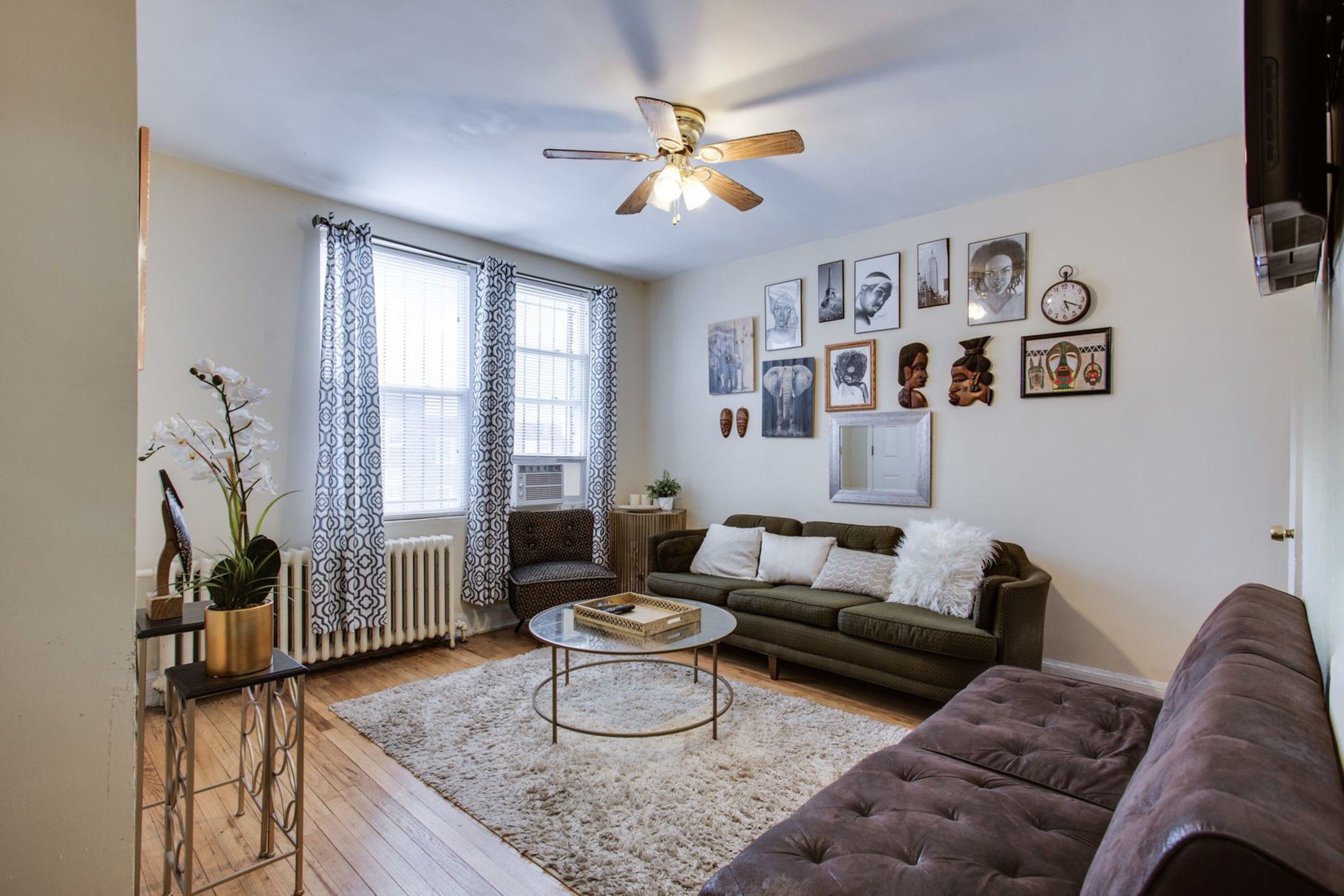 928 19th Street Northeast Washington, DC 20002 - Photo 3 of 13 a living room with furniture and a window