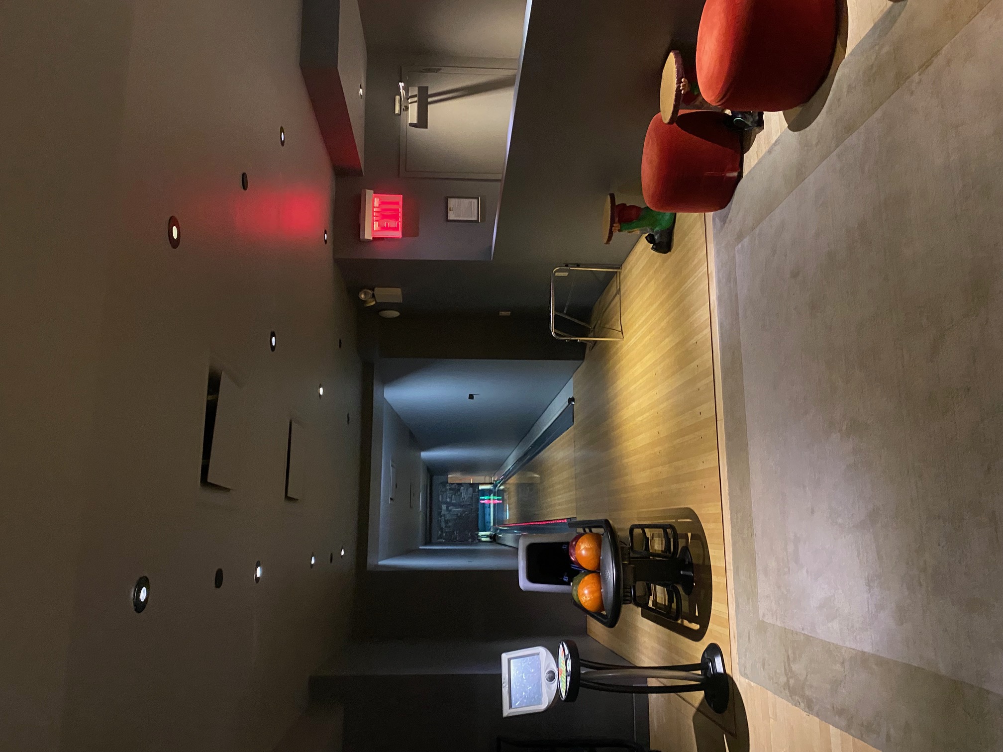 15 Broad Street, Unit 2300 Manhattan, NY 10005 - Photo 30 of 36 a room with furniture and a flat screen tv
