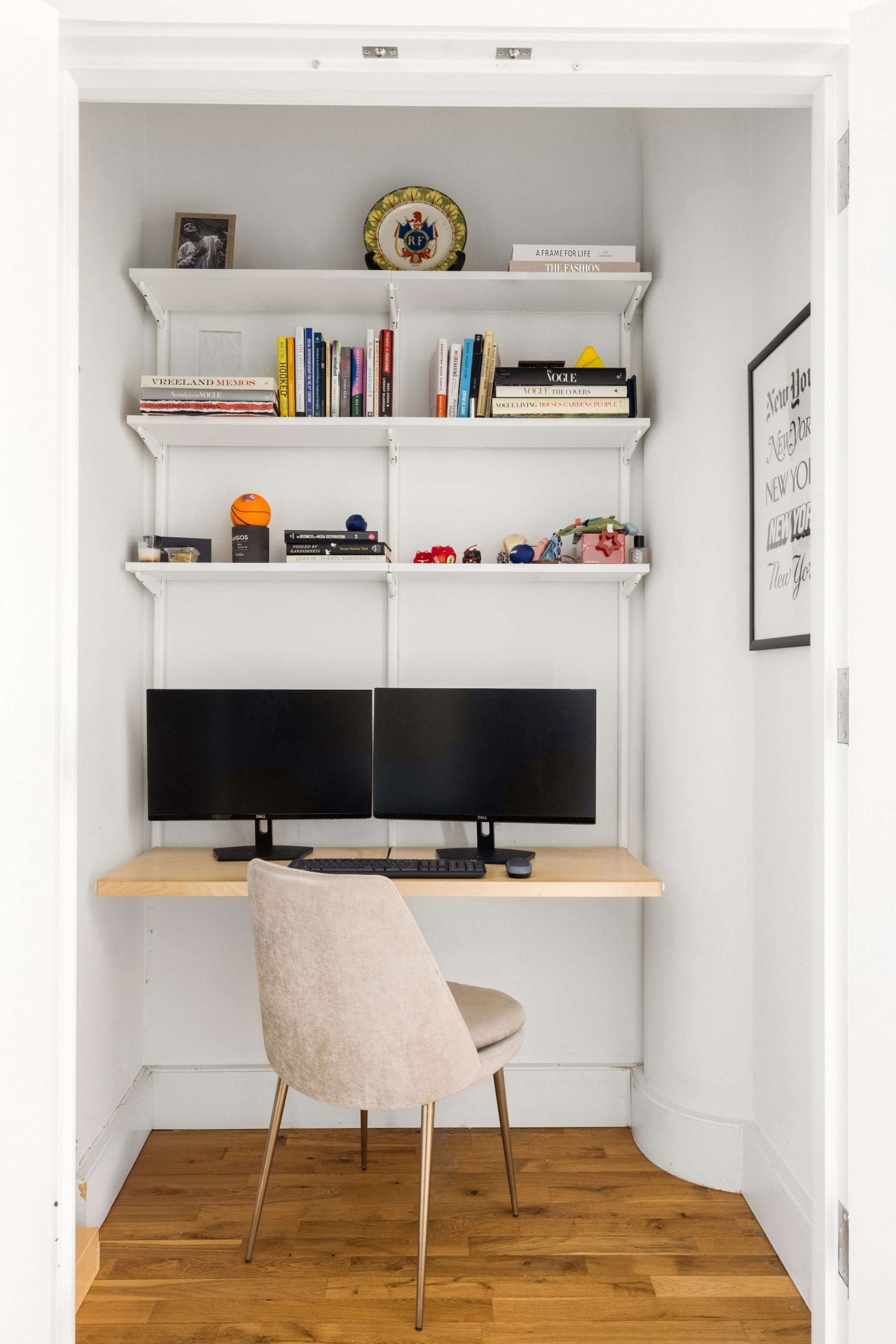 360 Furman Street, Unit 1110 Brooklyn, NY 11201 - Photo 9 of 23 a workspace with furniture and book shelf
