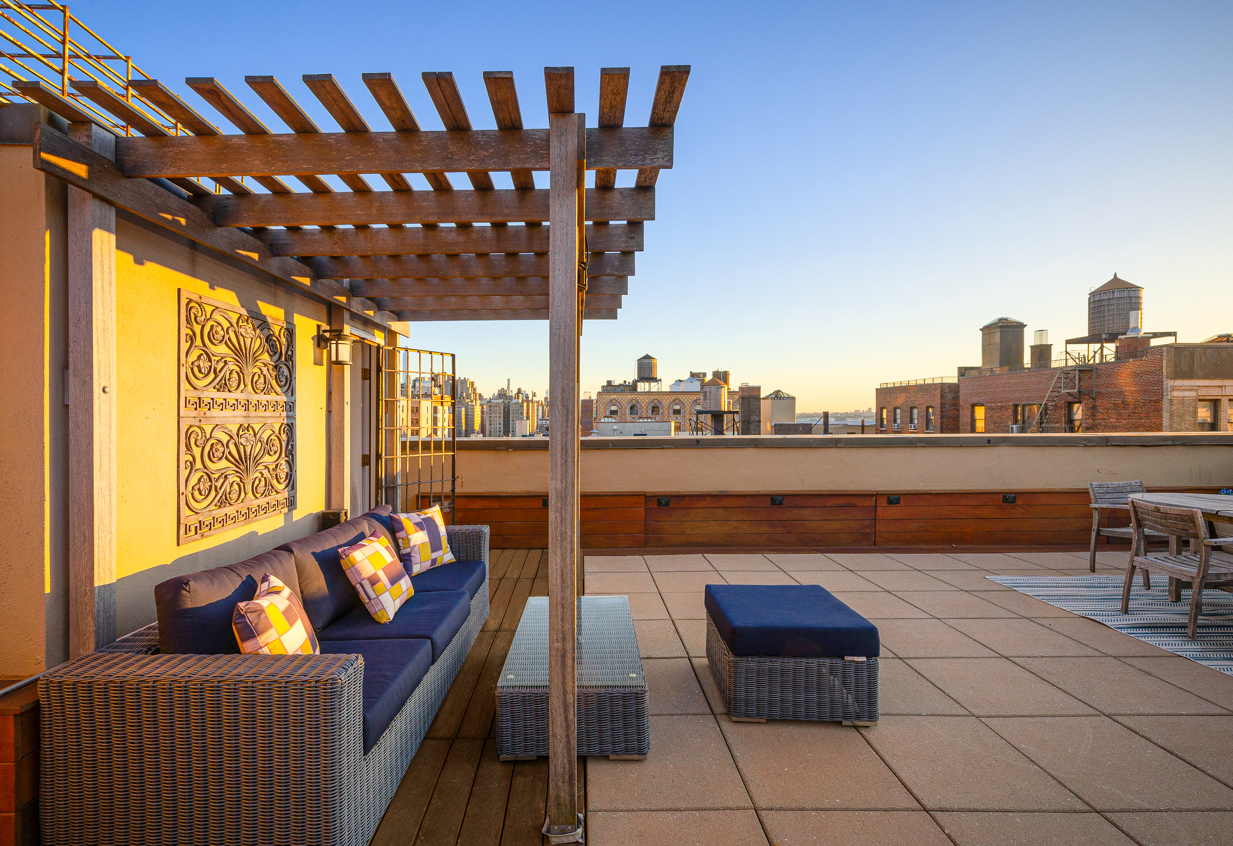 315 West 99th Street, Unit PHA Manhattan, NY 10025 - Photo 14 of 17 a living room with furniture and a floor to ceiling window