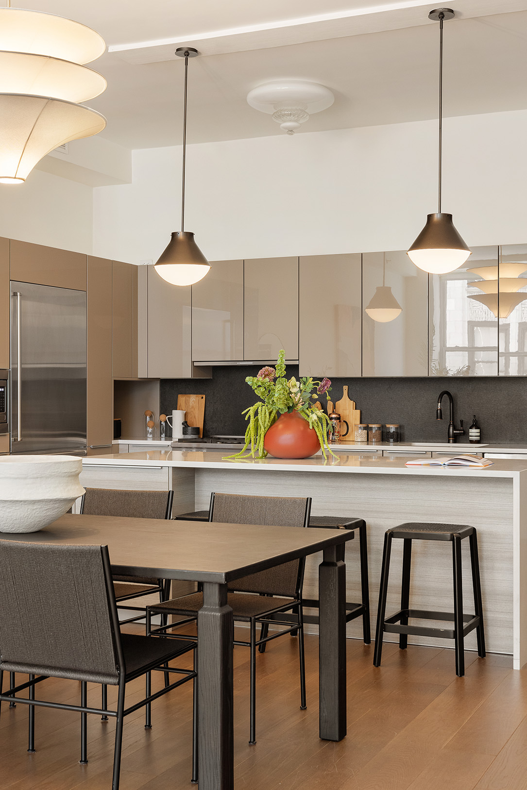 42 East 20th Street, Unit 4AD Manhattan, NY 10003 - Photo 7 of 19 a kitchen with a table and chairs in it