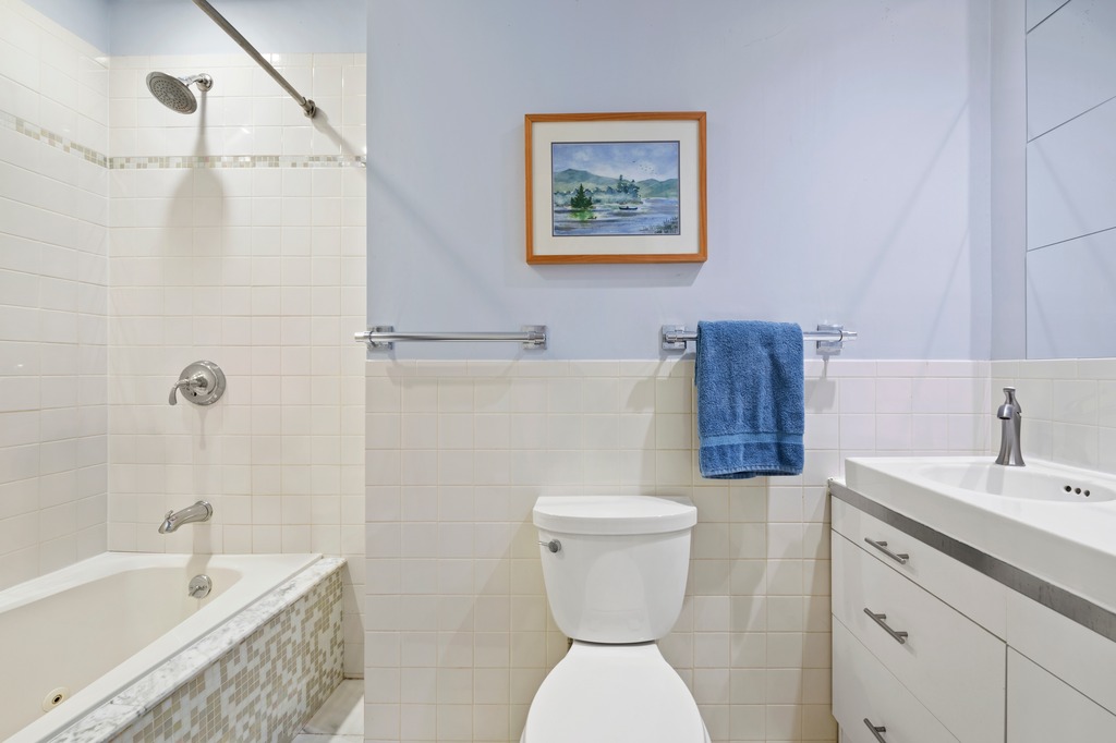 82 Visitation Place, Unit 2 Brooklyn, NY 11231 - Photo 6 of 12 a bathroom with a toilet a sink and bathtub