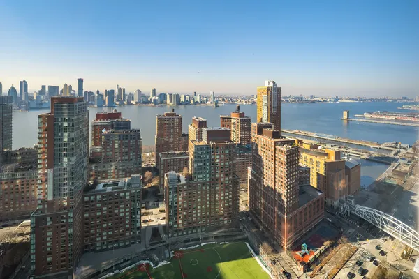 a view of a city with tall buildings