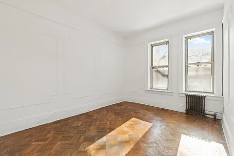 a view of a bedroom with window