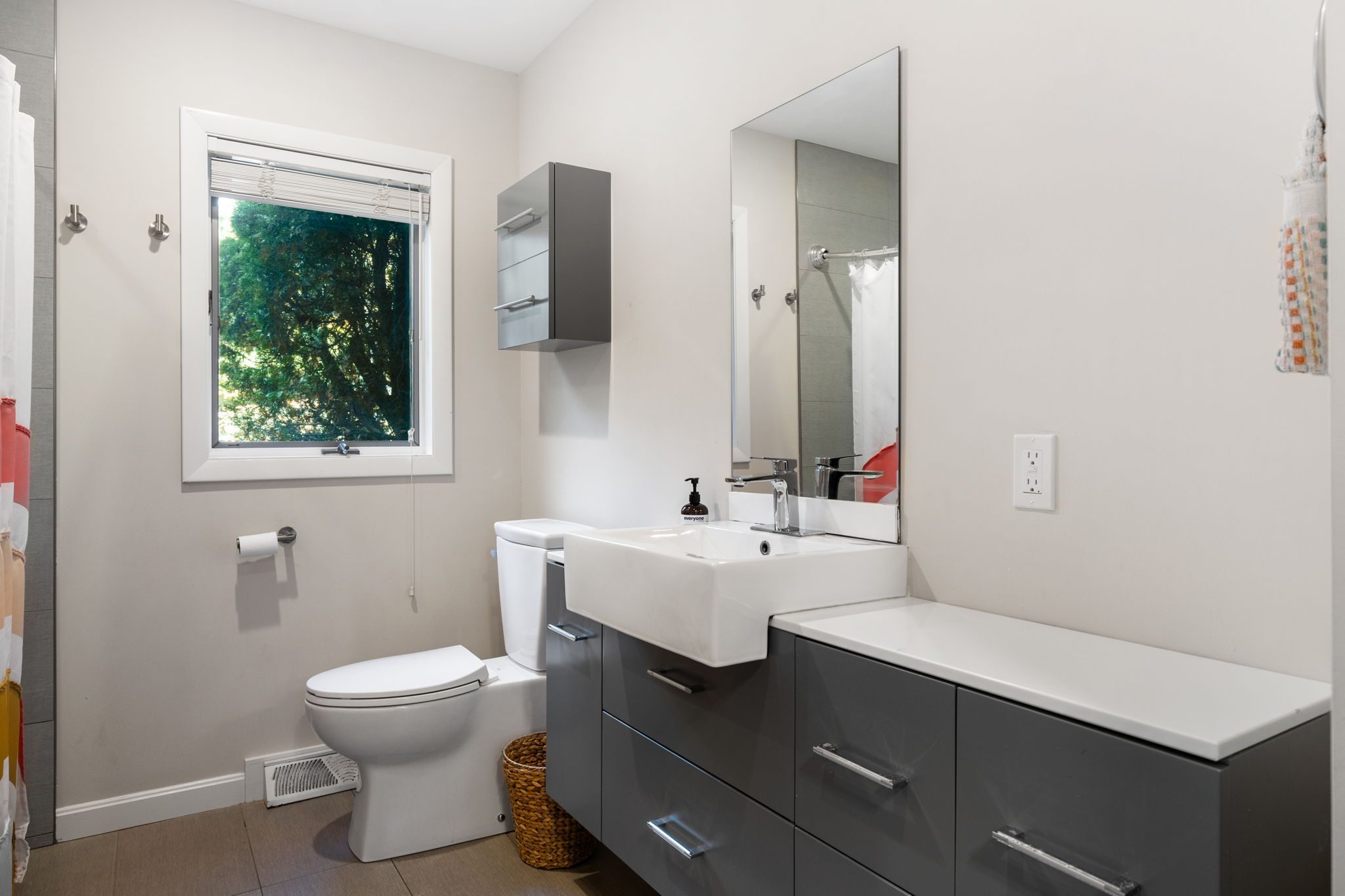 33 Thoreau Circle Beverly, MA 01915 - Photo 16 of 20 a bathroom with a toilet sink and mirror