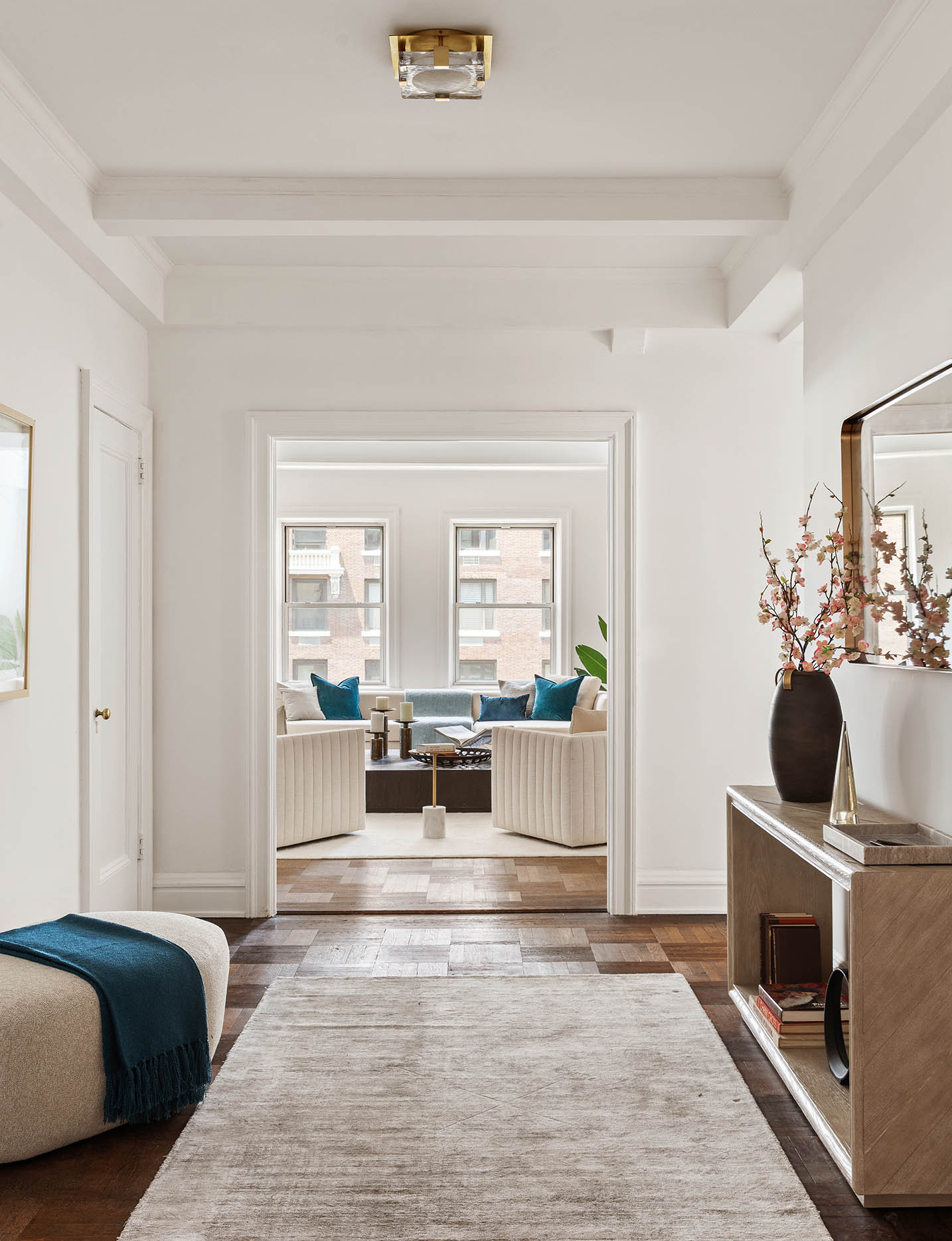 975 Park Avenue, Unit 10B Manhattan, NY 10028 - Photo 5 of 17 a living room with furniture and a fireplace