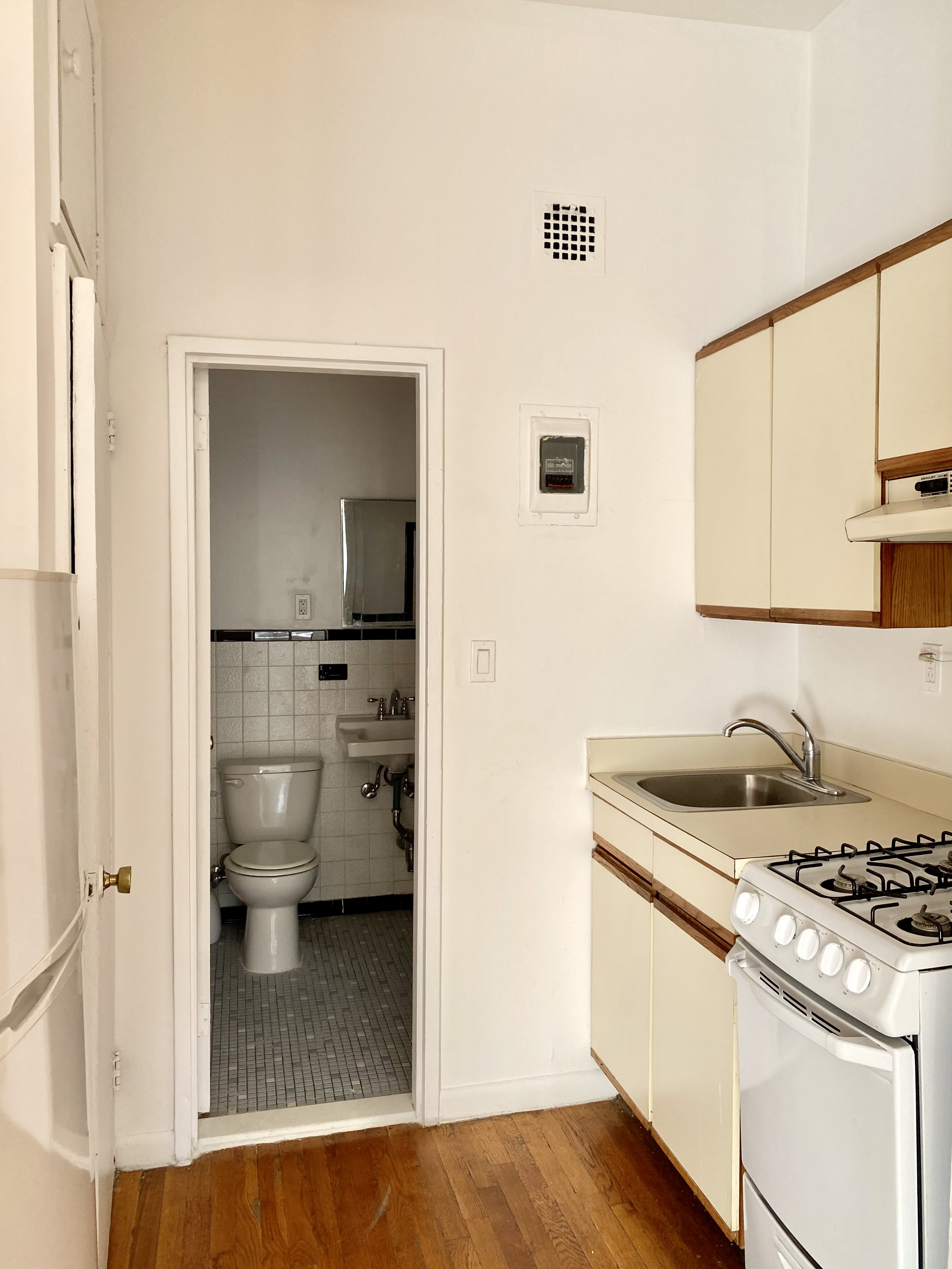 1736 2nd Avenue, Unit 3A Manhattan, NY 10128 - Photo 3 of 4 a kitchen with a sink and a stove top oven