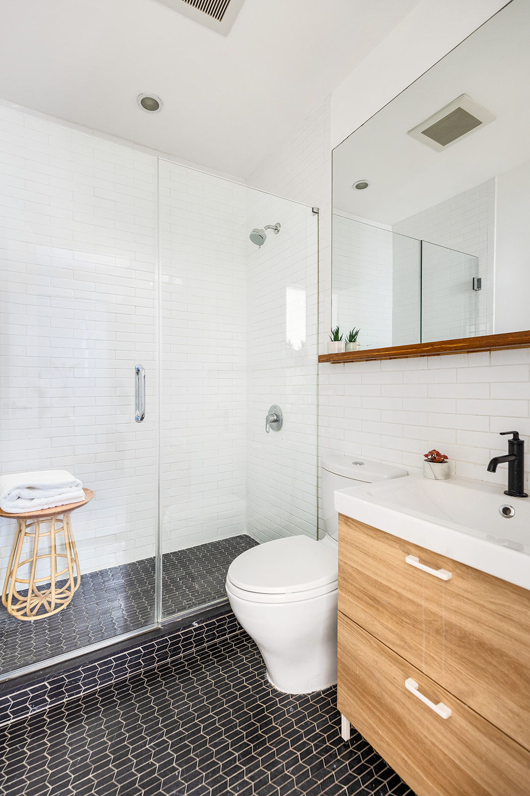 610 Marlborough Road Brooklyn, NY 11226 - Photo 6 of 16 a bathroom with a sink a toilet and a shower