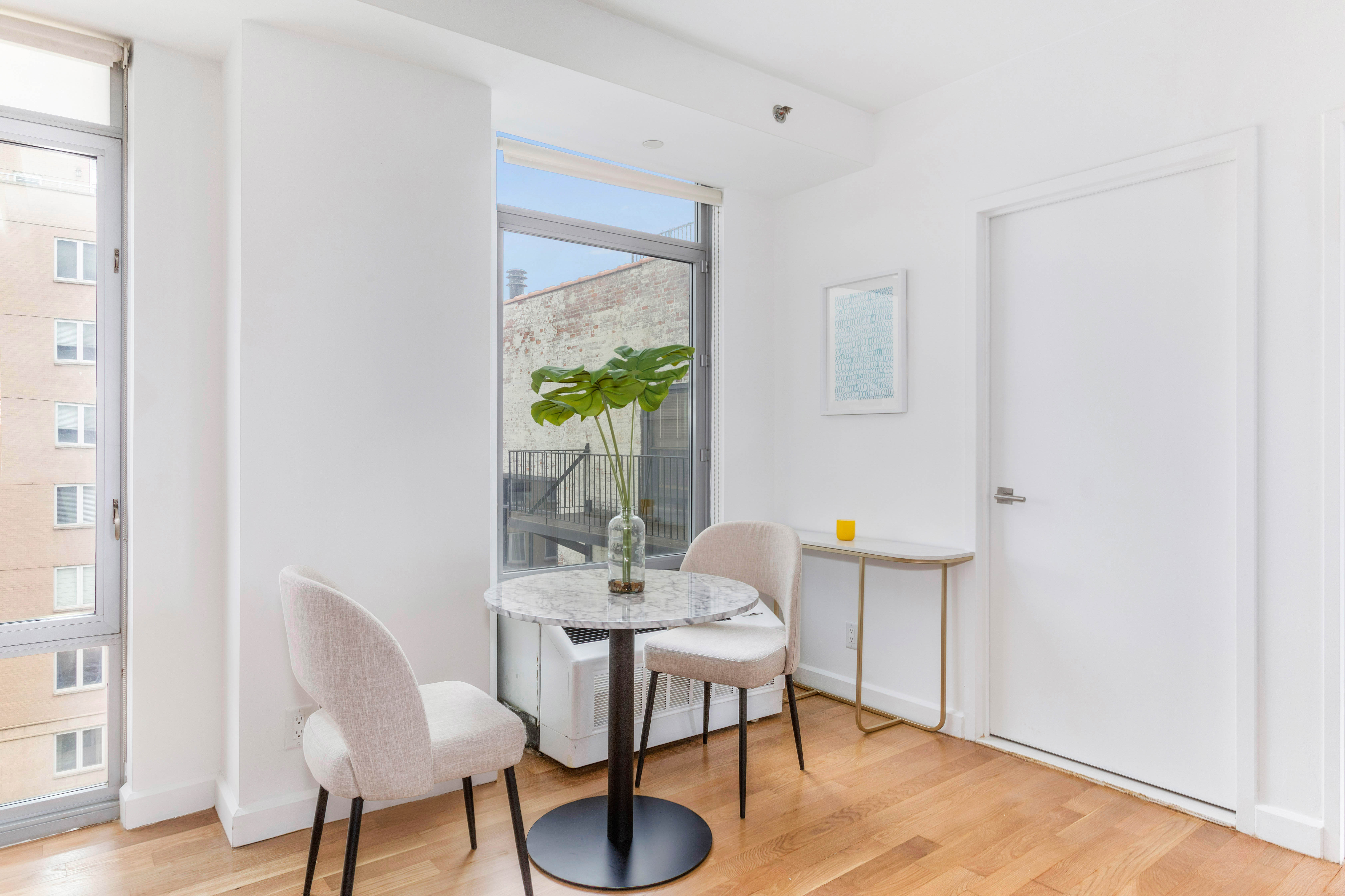 267 6th Street, Unit PHG Brooklyn, NY 11215 - Photo 3 of 17 a view of a livingroom with furniture and wooden floor