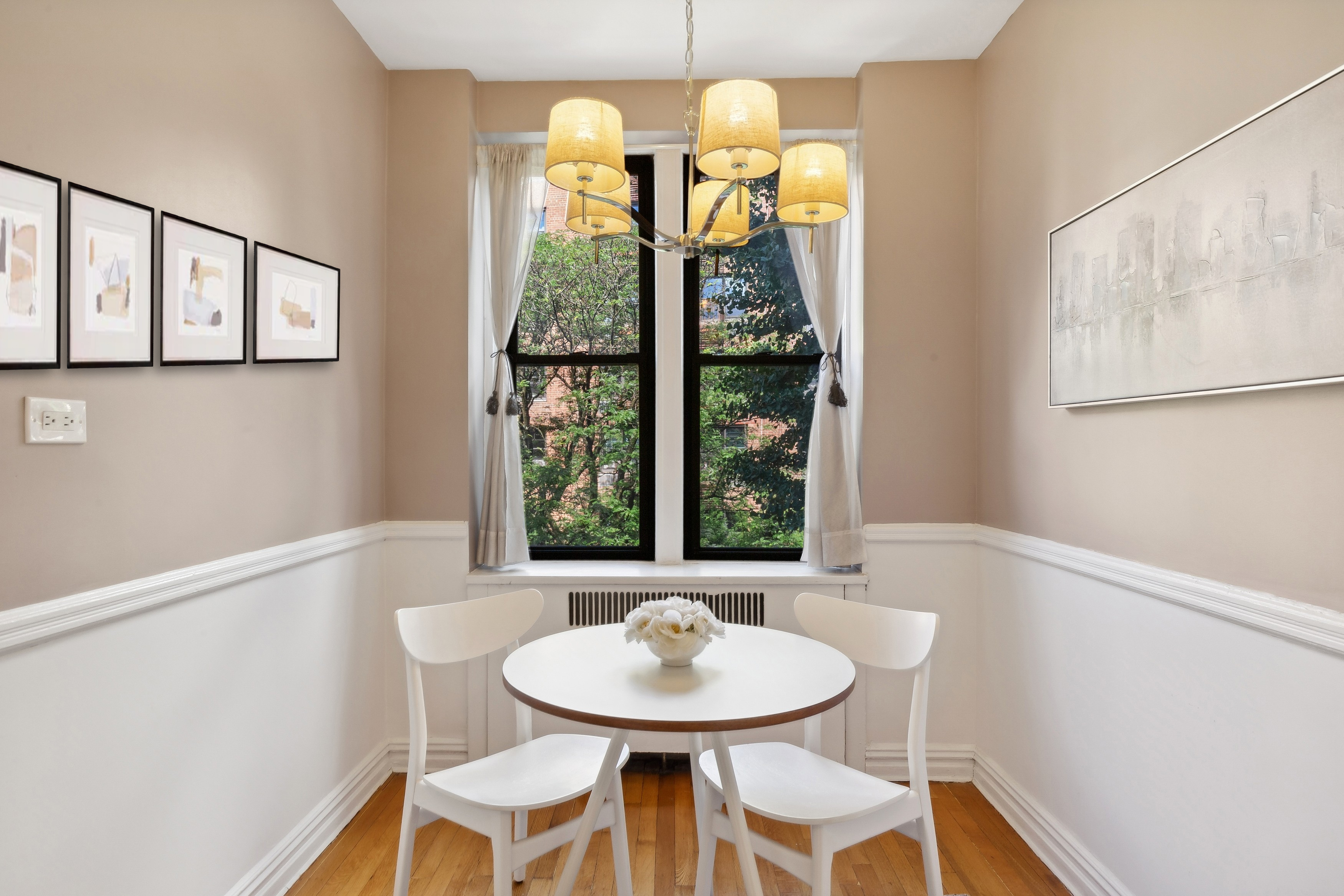 736 West 186th Street, Unit 5B Manhattan, NY 10033 - Photo 4 of 16 a view of a dining room with furniture and a window