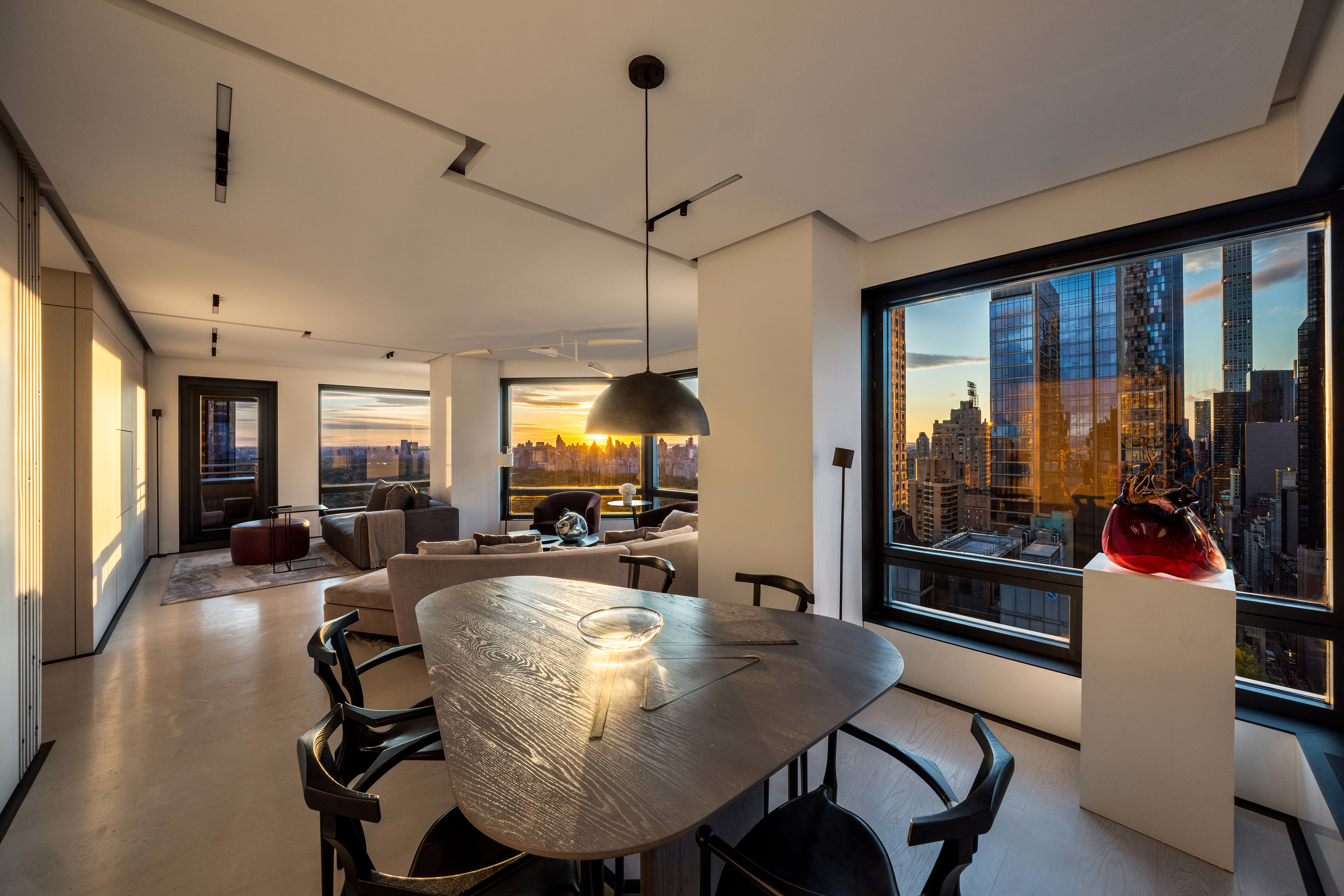 301 West 57th Street, Unit 36C Manhattan, NY 10019 - Photo 8 of 27 a view of a dining room with furniture window and outside view