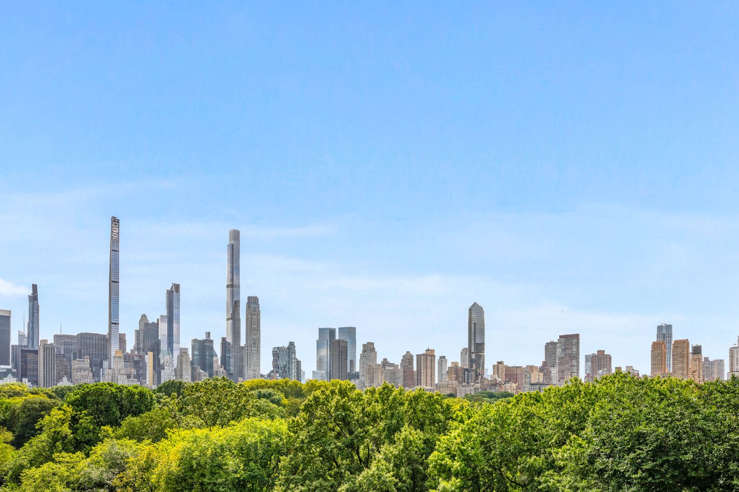 a view of a city with tall buildings