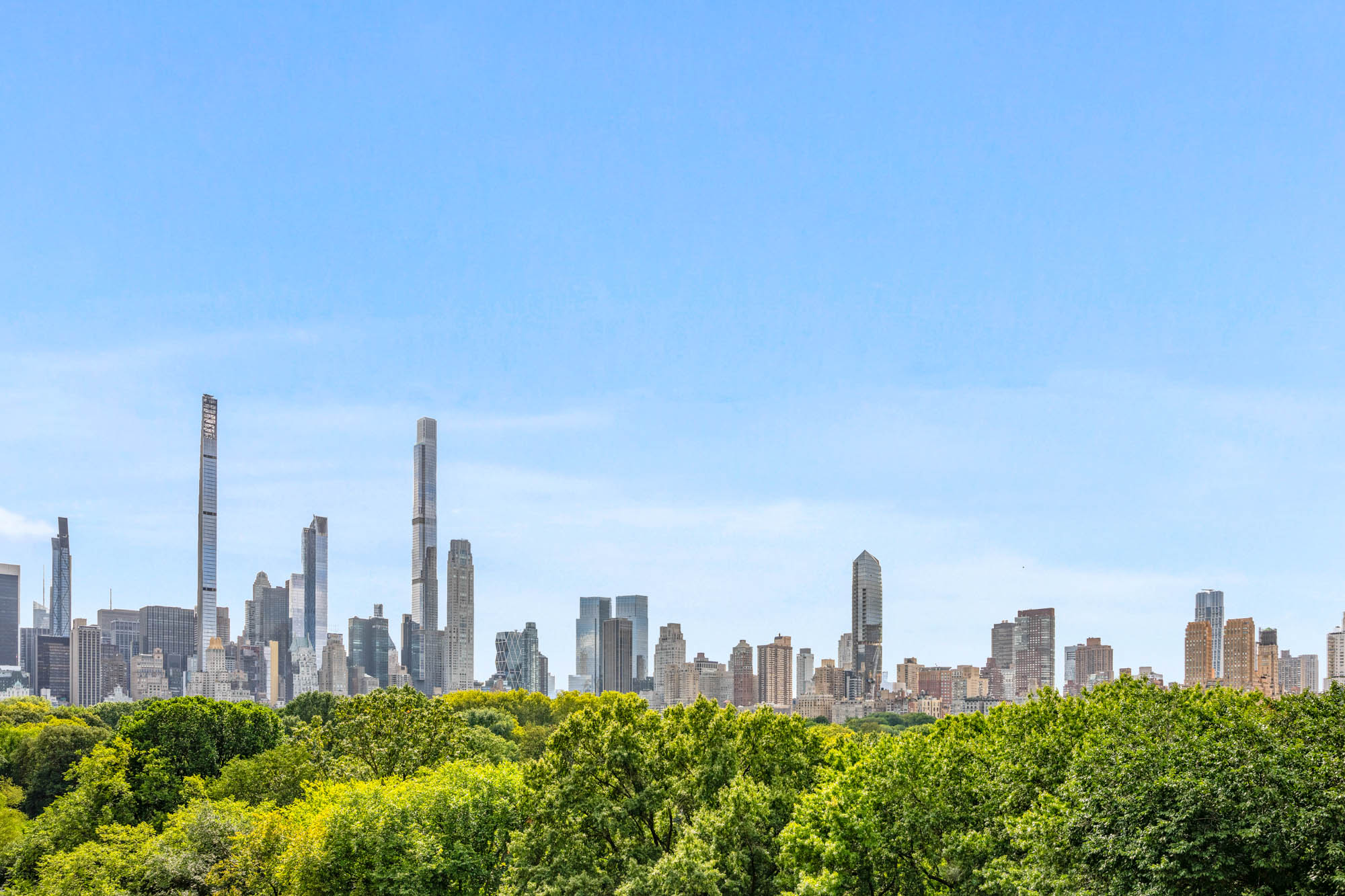 936 5th Avenue, Unit 10AB Manhattan, NY 10021 - Photo 3 of 37 a view of a city with tall buildings
