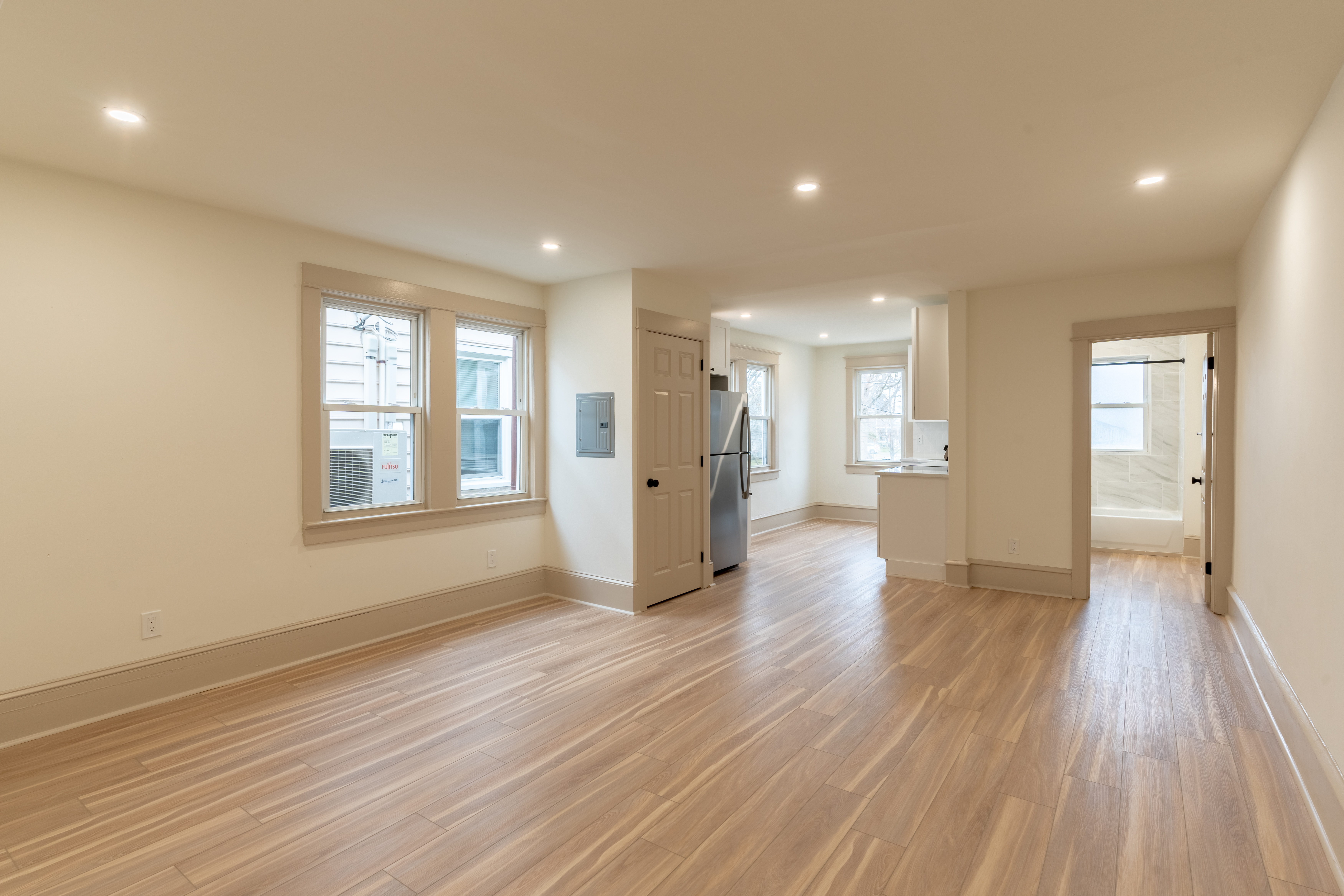 423 North Haddon Avenue Haddonfield, NJ 08033 - Photo 15 of 16 a view of an empty room with wooden floor and a window