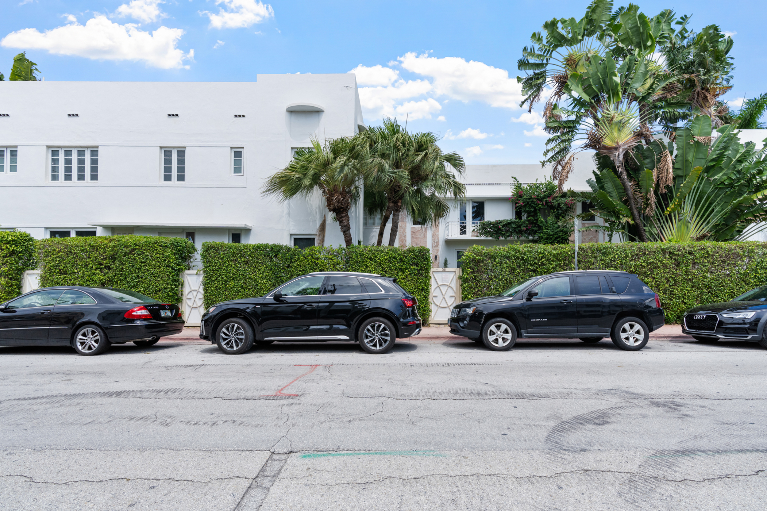 711 East 14th Street, Unit 7 Hialeah, FL 33010 - Photo 2 of 36 a view of a car parked in front of a house