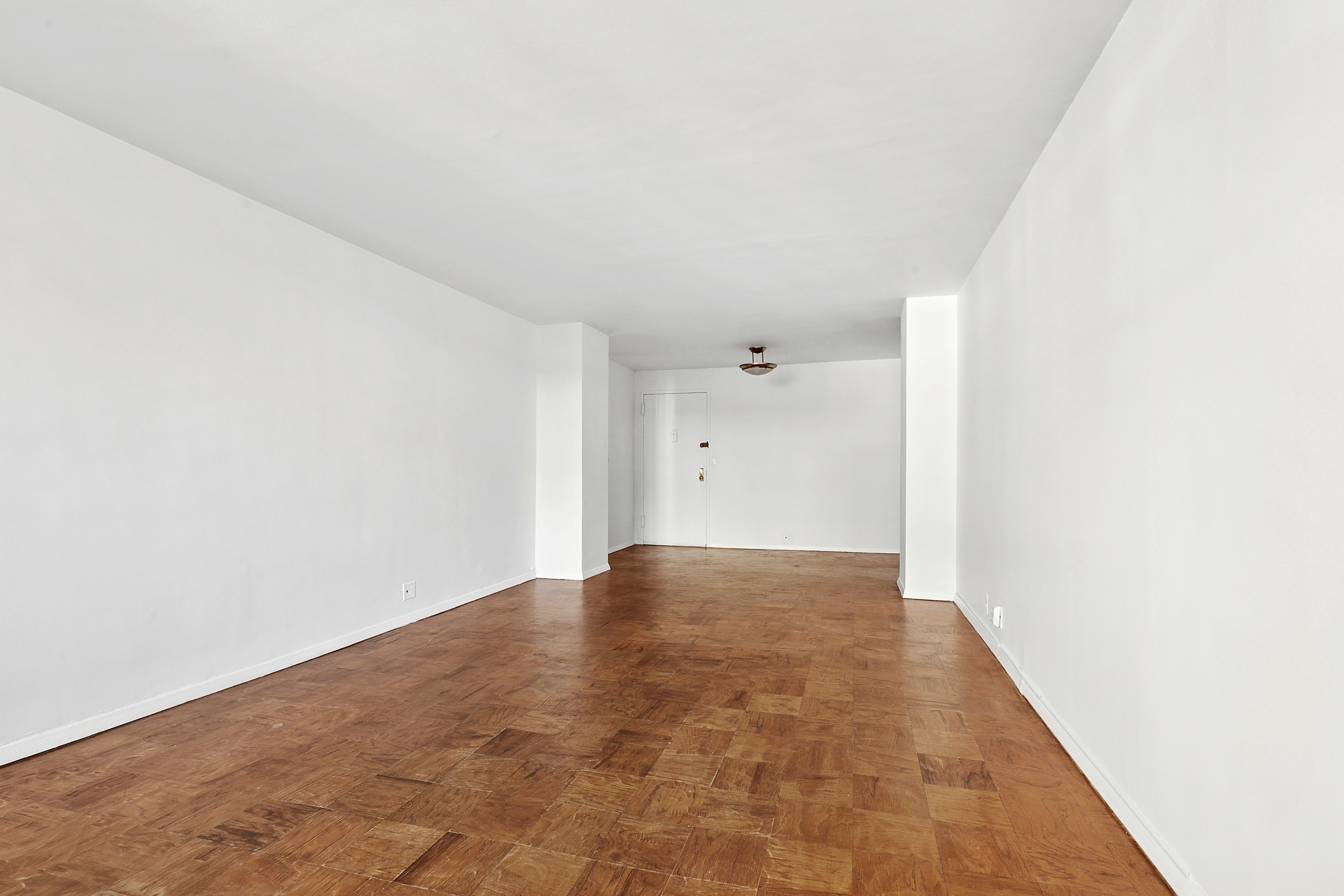 201 East 36th Street, Unit 5D Manhattan, NY 10016 - Photo 8 of 9 a view of an empty room