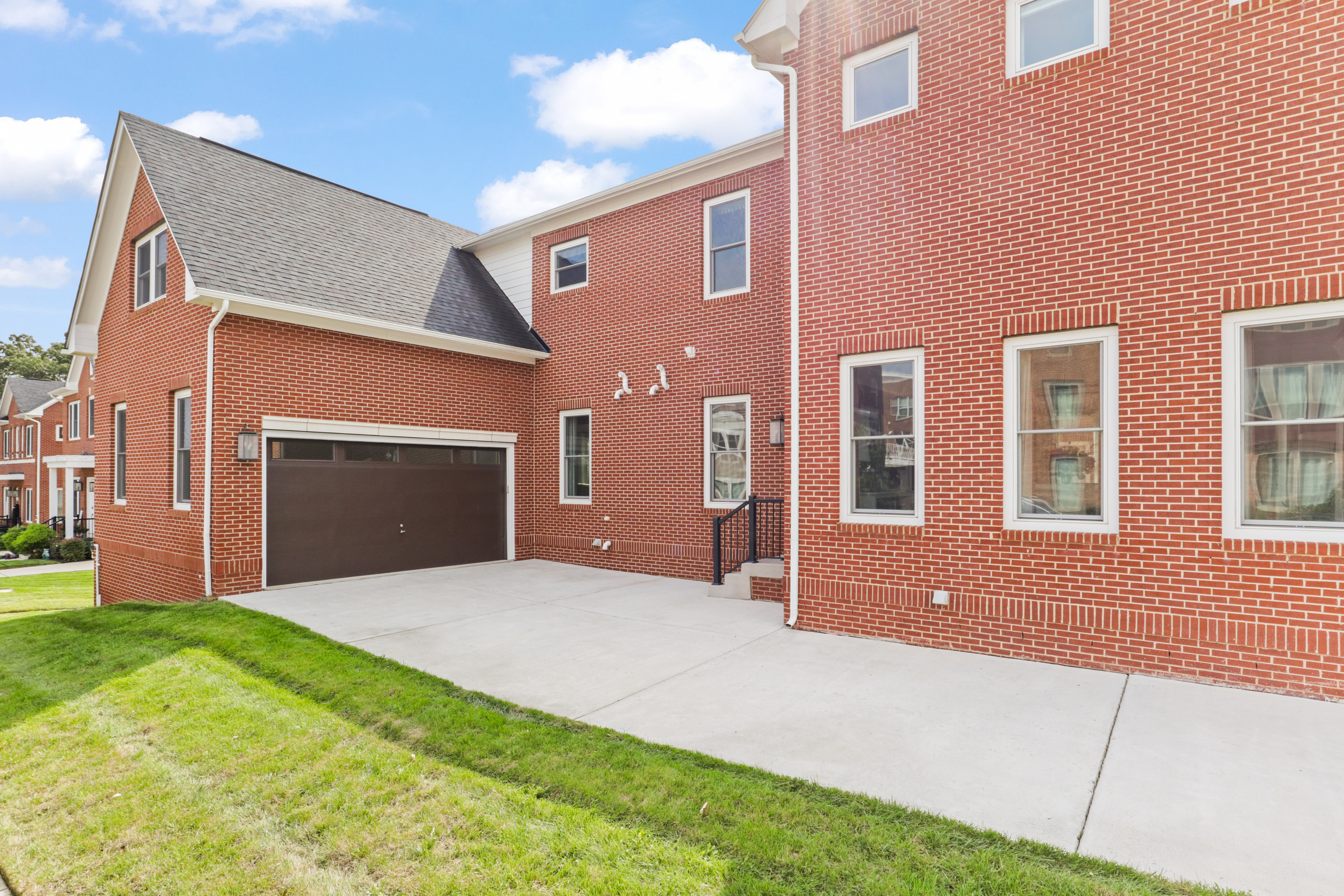9101 Power House Road Lorton, VA 22079 - Photo 61 of 75 a front view of a house with yard and garage